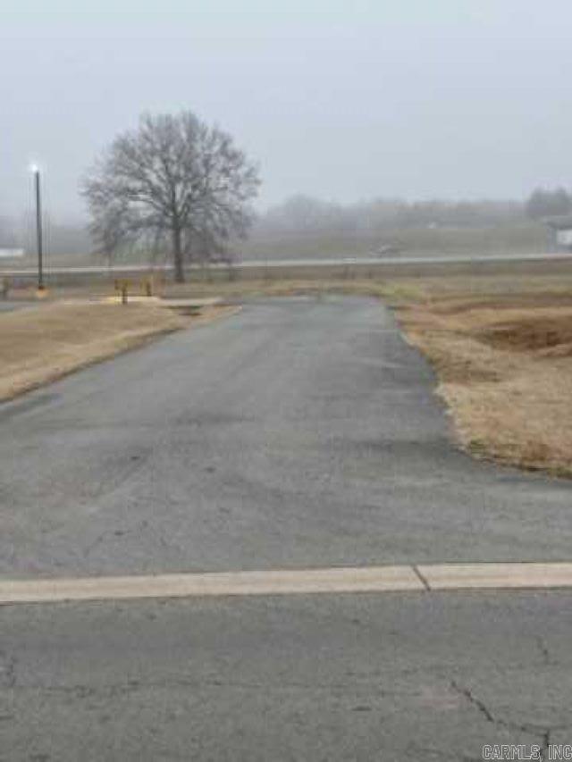 This prime property highly visible from both I-40 and Highway 9.  This is one of the few tracts left this close to I-40 Exit 108 with this amount of available acreage.  The property includes a strip of land adequate to build a driveway /street to connect to Bruce street.  The property is zoned B-3 Highway Service, which allows for outside open display.