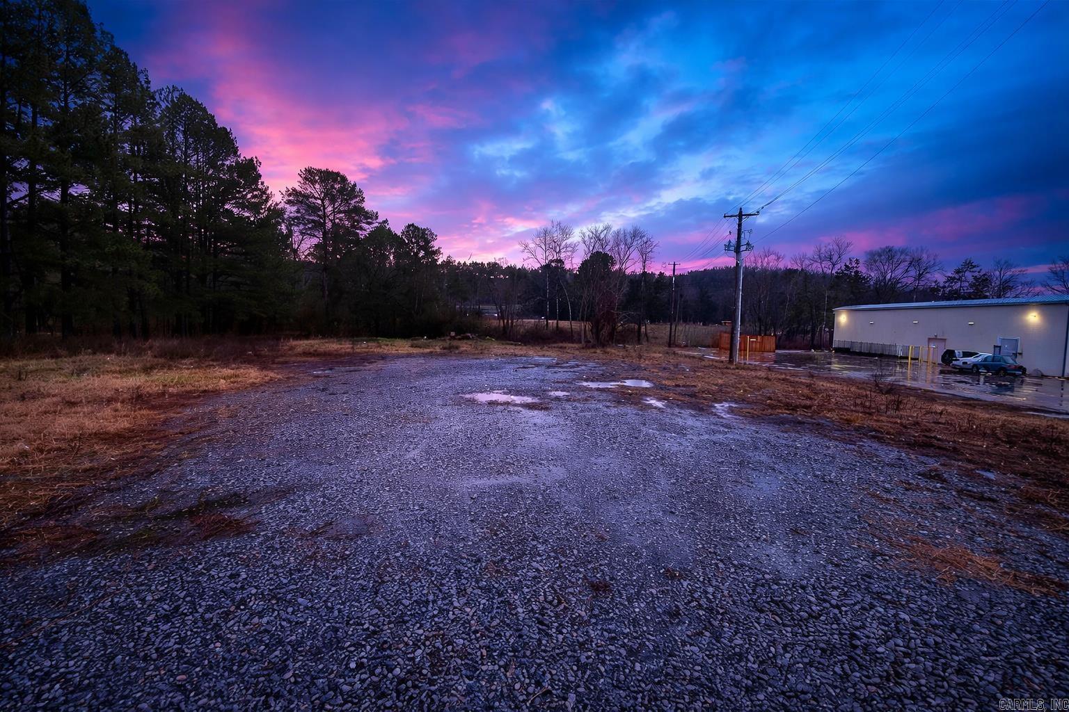 Prime commercial lot in the heart of Rose Bud, offering exceptional visibility and accessibility. Located next to the newly built Family Dollar and prominently situated at the Highway 5/Highway 36 intersection, this high-traffic location is ideal for your business venture. Rose Bud's recent growth, attracting established retailers like Dollar General, Family Dollar and Sonic, signals a thriving market ready for your contribution. The property features convenient city sewer access and a recent survey is available. Don't miss this opportunity to be part of Rose Bud's continued success. Great investment opportunity!!