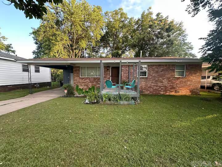 Updated 3 bedroom, 1 spacious bath. all brick home. Available for August 15th move in. Includes gas stove, refrigerator, dishwasher, microwave, washer, dryer, ADT alarm, and fiber internet included in rent. Central air and heat. Carport storage. Modern amenities are located within and right outside of town, giving residents plenty of shopping and dining choices at places like McCain Mall and Lakewood Village. Outdoor recreation is abundant with forested parks and trails as well as the ones surrounding the Arkansas River. Close proximity to LRAFB.