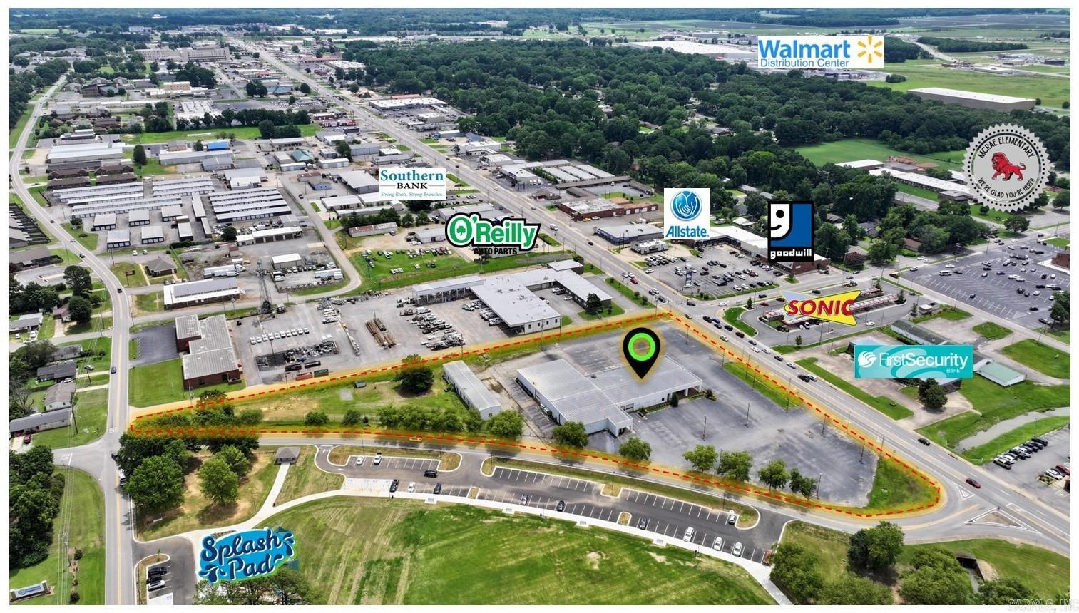 This versatile C-4-zoned property offers two buildings on a sprawling 4.90-acre lot, ideal for retail, automotive, or industrial-flex use. Situated on a major arterial road with excellent visibility and exposure to 24,000 VPD (Vehicles Per Day). 26,568SF total across two buildings, featuring an automotive showroom, dedicated office space, and a warehouse with 12 roll-up doors. Surrounded by established national retailers, local businesses, and prominent medical centers. Perfect for an owner-user or an investor looking to tap into Searcy’s recent commercial expansion and robust economic development. Agent See remarks