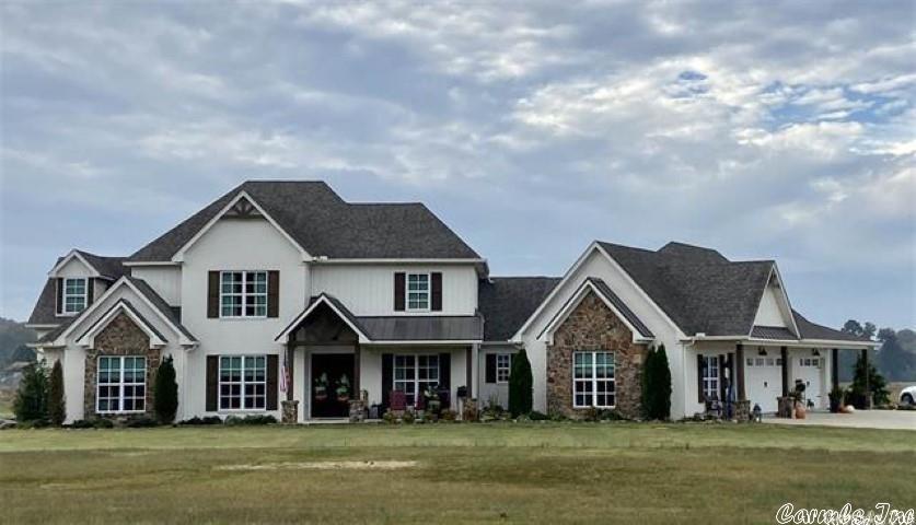 Amazing home with so many extras. 5400 sq ft, 6 bedrooms, 5 baths, movie theatre room, huge playroom, oversized office. Pool with outside pavilion and built in outdoor kitchen. Fully fenced in 68.4 acres.