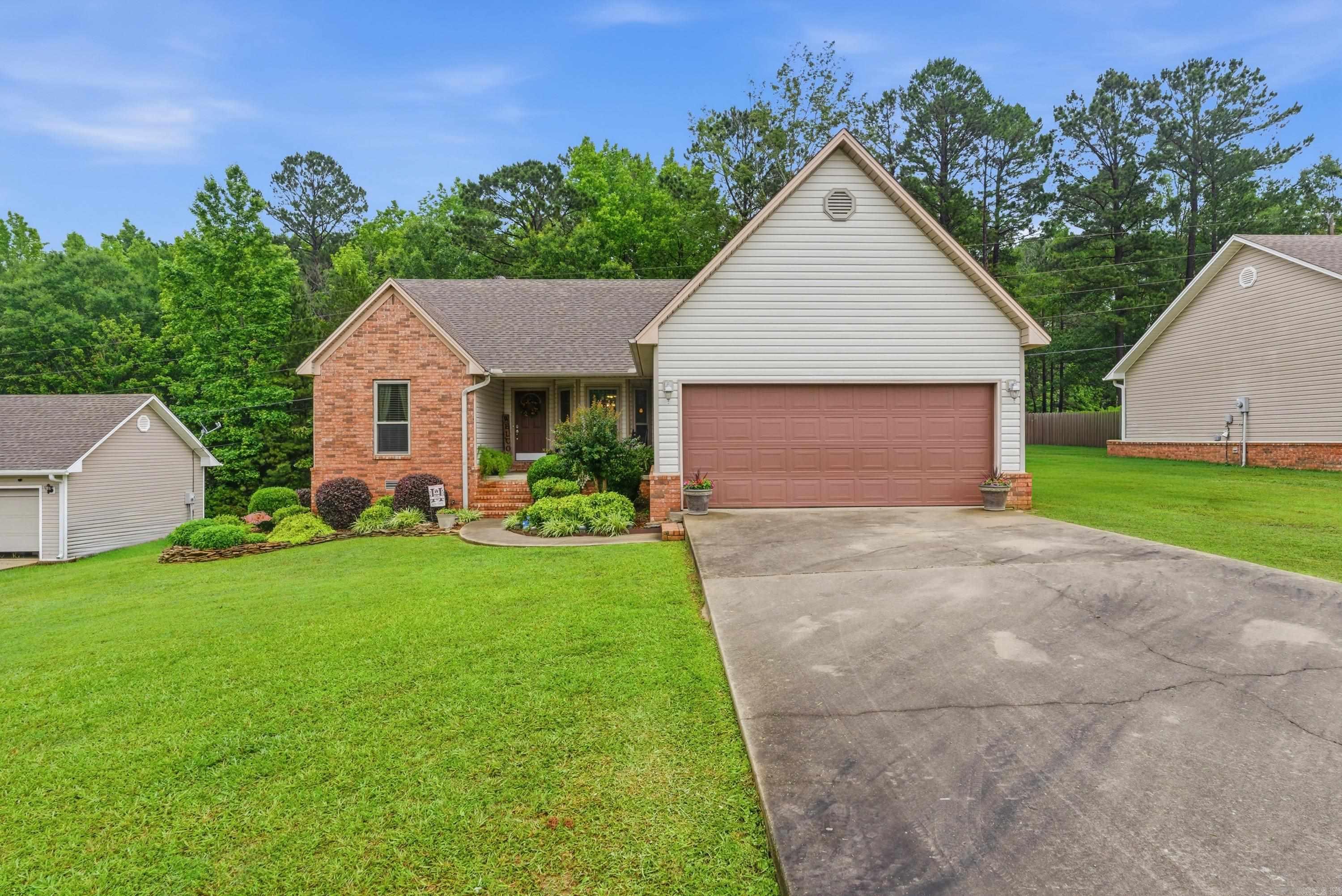 Welcome home to this beautifully updated 3 bedroom, 2 bath home featuring a desirable split floor plan and 1570 square feet of living space. The spacious kitchen offers plenty of cabinetry and a pantry for extra storage. Recent updates include a new roof (2026), HVAC (2026), windows, flooring and back deck are also updated. Outside you'll love the 16'x20' air-conditioned outbuilding--perfect for an office or workout space. Located in a great neighborhood, this move-in ready home is one you won't want to miss!