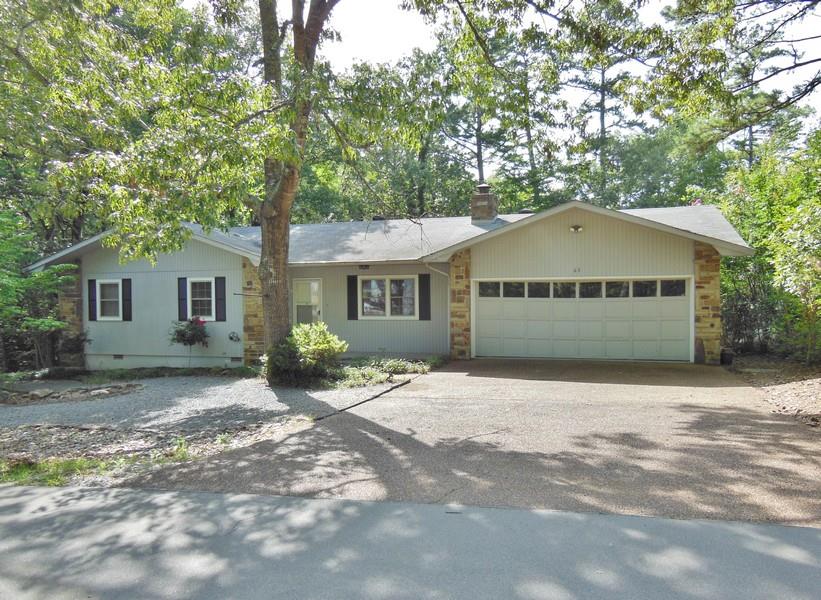 One level 3BR/2BA home with a beautiful lake view setting is common to Lake Coronado. Centrally located near golf courses, natatorium, tennis courts and lake. Bright living room with gas-log fireplace & laminate wd floor has access door to sundeck and is only a stone throw from the water. Efficient kitchen with breakfast area w/French door to deck.  Ideal way to enjoy the lake without paying the high lake front cost.  Come check it out.
