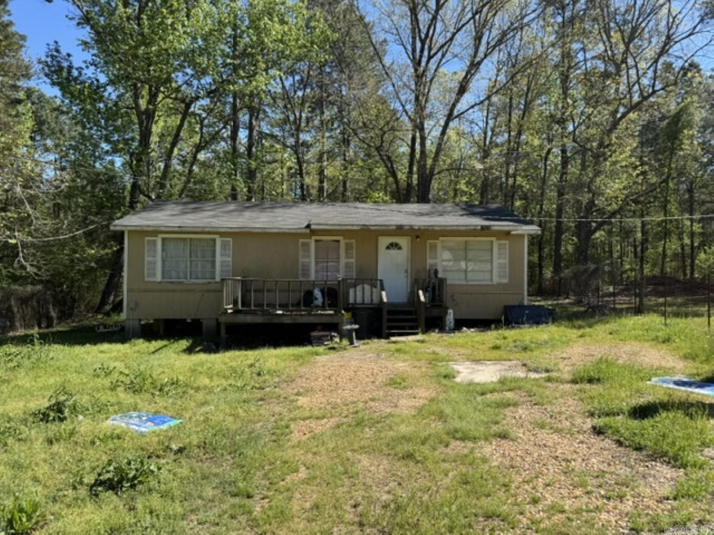 Experience peaceful country living on this spacious 2-acre property, conveniently located near White Oak Lake. Built in 1984, this charming home features 3 bedrooms and 1 bathroom, equipped with central heating and air conditioning for year-round comfort. Whether you're a first-time homebuyer or searching for the perfect hunting or fishing retreat, this property is an excellent choice. Enjoy easy access to both White Oak Lake and Bragg Lake, renowned for their outstanding fishing opportunities. Don’t miss your chance to own a cozy home in a prime recreational area.(Please use cation when on front porch).
