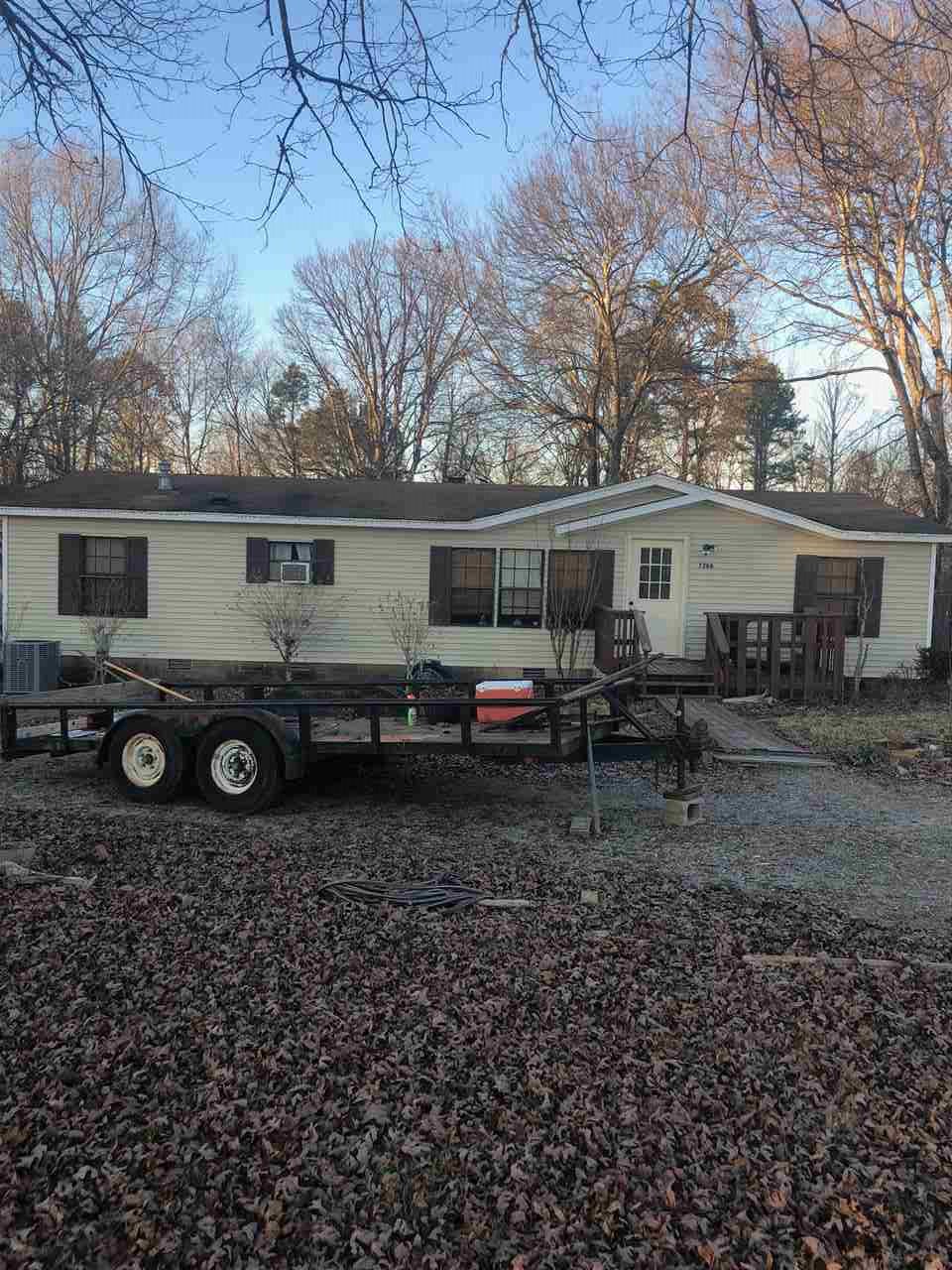 11 acres + or - with mobile home