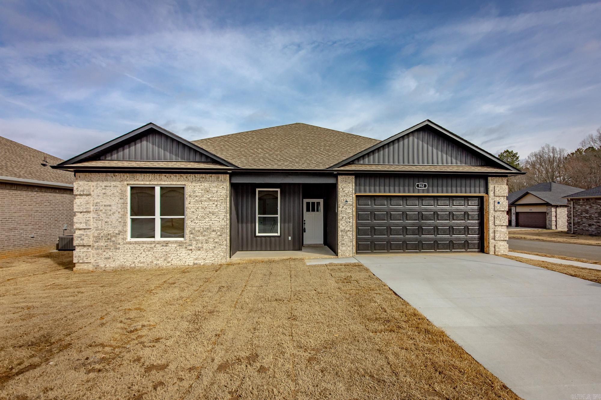 Welcome to this stunning new construction home that perfectly blends modern design with everyday comfort. Featuring 3 spacious. bedrooms & 2 full baths, this thoughtfully designed split floor plan offers both privacy & functionality. Step inside to an inviting open-concept layout, ideal for entertaining & daily living. The living room showcases a beautiful vaulted ceiling with a striking stained beam. Luxury vinyl flooring throughout the home, complemented by gorgeous granite countertops in the kitchen & baths. Retreat to the primary suite where you'll find a beautifully designed walk-in tiled shower. Situated on a desirable corner lot within a gated community, this home features also covered patio for relaxing and a 2 car garage. With generously sized rooms & high-end finishes throughout, this home offers the perfect combination of style, comfort, and low maintenance living. Seller will pay for the first year of HOA/POA dues !!!
