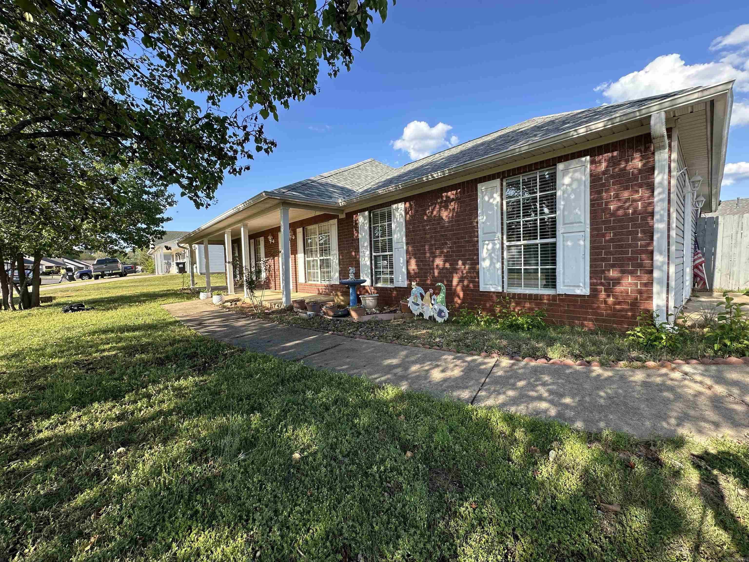 This family friendly home offers plenty of room with over 2000' of living space including 4 bedrooms, 2 bathrooms, a large living room and huge bonus family room!   Lots of upgrades including a new roof, updated paint, updated HVAC and solar panels that come with the house!  The addition of the solar panels means this home will be extremely efficient.   This corner lot offers access to the yard from two sides and a fully fenced backyard with extra storage building is great for those family get togethers and plenty of space for everyone.  Summer will be a blast with the above ground pool ready for splashing and making big memories!  Step across the street and you have a nice fishing lake and community park ready for fun and family time!  You will love living in this great location in Harmony Grove area just minutes from town.