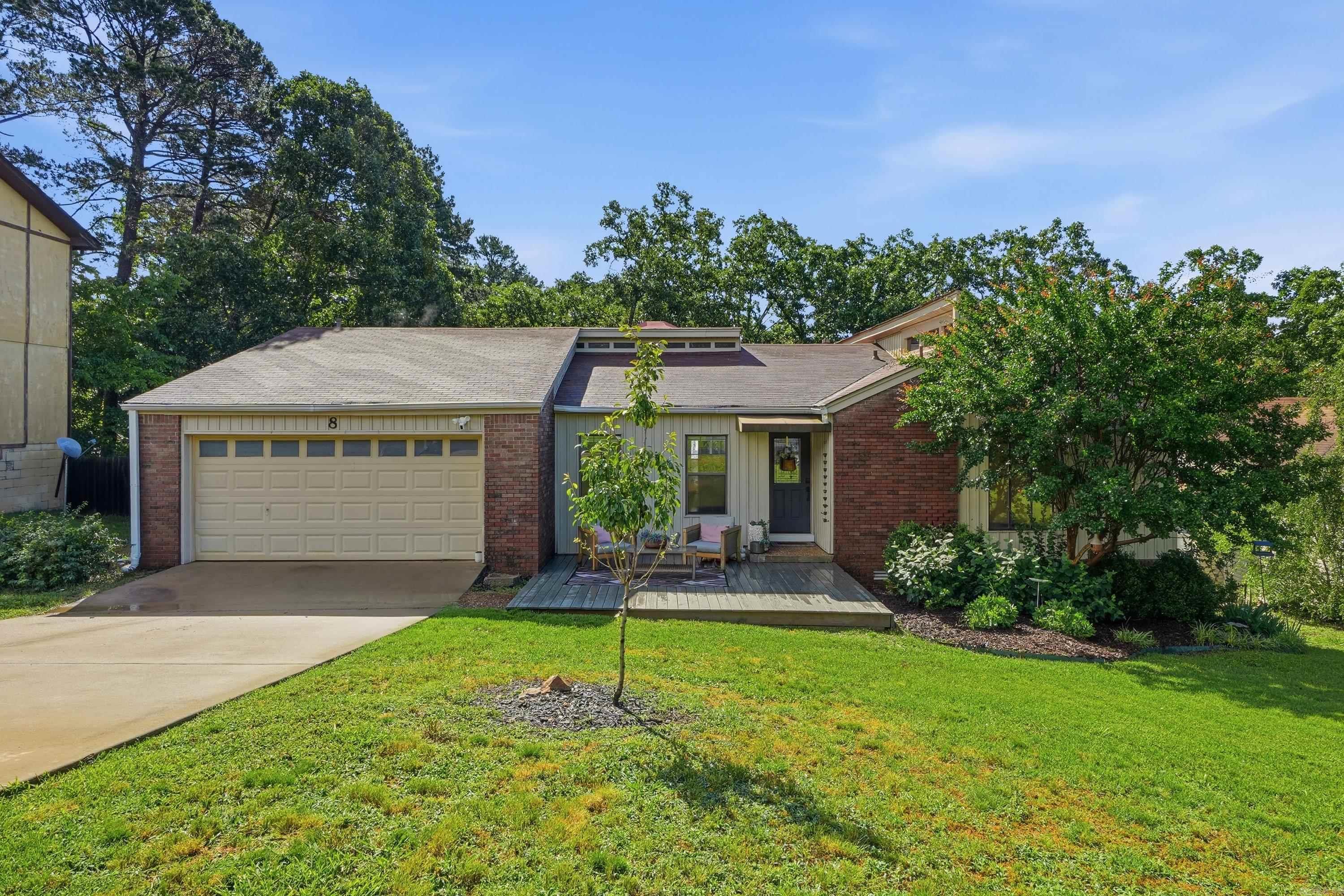 Head over to Hightrail. With midcentury and contemporary influences woven throughout, this beautiful one-level home in Maumelle carries a newer build feel inspired by styles that have stood the test of time. Architectural detail and natural light fill every corner — high ceilings and an open floor plan doing exactly what they were designed to do. Solid surface flooring runs throughout, tile and LVT keeping things as maintenance. The kitchen anchors the heart of the home with granite countertops, and thoughtful wallpaper accents give each space its own personality without trying too hard. The formal dining room is versatile enough to become a second living space, a home office, or whatever your life actually calls for. Out back, a large deck overlooks a fully fenced yard with the kind of space that makes you want to linger — and with walking trails just steps away, the outdoor living doesn't stop at your fence line. Beloved Lake Willastein, the Maumelle Aquatic and Community Center, groceries, dining, and quick highway access are all just minutes away. A great entry price into one of Central Arkansas's finest communities, this one is ready for your next chapter.