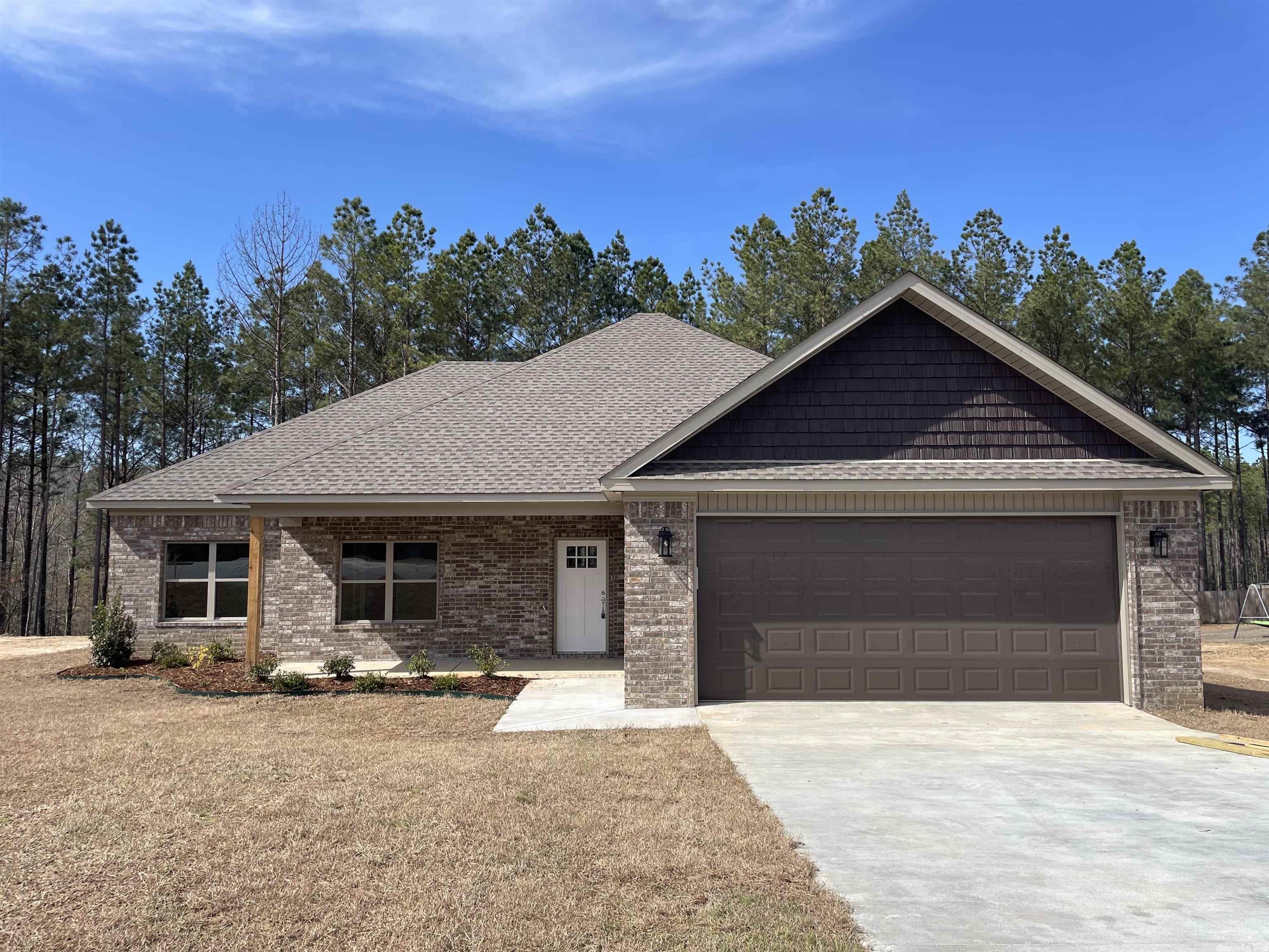 This New Construction home Located in The Pines at Parkway Trail will be completed Mid March. This home has 4 bedrooms and 2 bathrooms. Enjoy the open floor plan, perfect for gatherings and family time. The home includes luxury vinyl flooring in the main areas with carpet in the guest bedrooms. You will love the upcoming amenities Parkway Trails will soon have! Ponds, walking trails, and a park! Schedule your showing today!