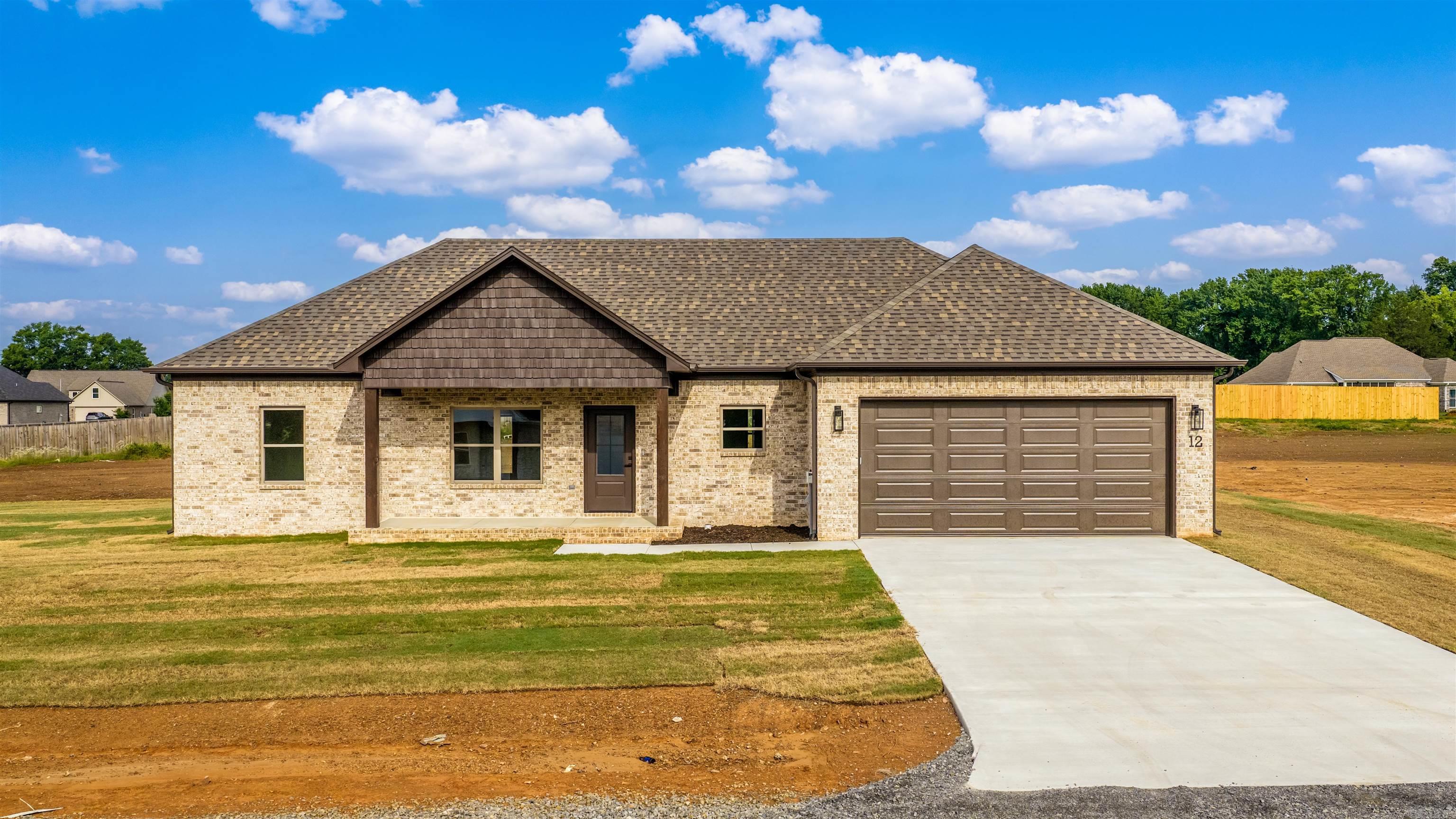 Brand-new construction offering modern style and thoughtful design throughout. This single-story home features an open-concept layout with a spacious living area, high ceilings, and abundant natural light. The kitchen includes a large center island, granite countertops, and custom cabinetry.  The primary suite and additional bedrooms are designed for comfort and functionality with contemporary finishes. A covered front porch adds curb appeal and a welcoming touch. Enjoy a seamless flow between living, kitchen, and dining areas, plus plenty of storage and workspace throughout the home. Situated on a generous lot with room to personalize landscaping or outdoor living spaces. Move-in ready soon! Don’t miss the opportunity to own a beautifully crafted new home with quality finishes and modern appeal.