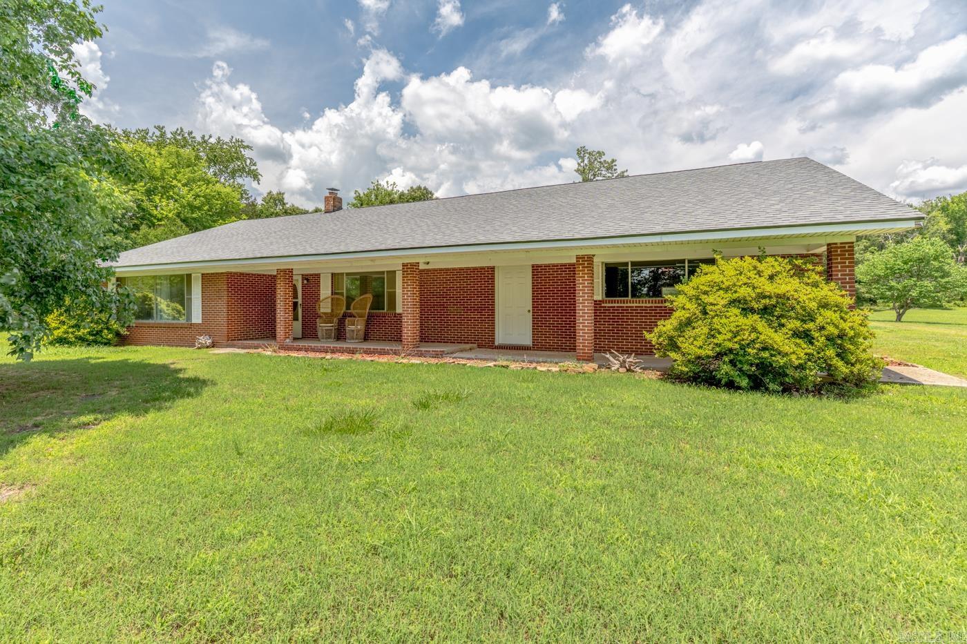 Welcome to Market 506 Hell Creek Road in Mountain View, Arkansas!   Enjoy Ozark living at its best in this beautiful area!  Situated on 4.93 scenic acres with a perfect mix of wooded privacy and open space, this Brick home offers the ideal country setting.  Featuring 2,082 sq ft, this well-maintained home includes an oversized 2-car garage, spacious living areas, and valuable updates throughout. Recent improvements include a NEW roof (2024), NEW garage doors (2023), NEW septic tank (2023), and a beautiful new Derma Bath Fitters walk-in shower in the primary bath with a transferable lifetime warranty.  Enjoy all that country living offers while still being just minutes from the charm and attractions of Mountain View. A perfect full-time home, getaway, or retreat with room to relax and roam!  Call today!