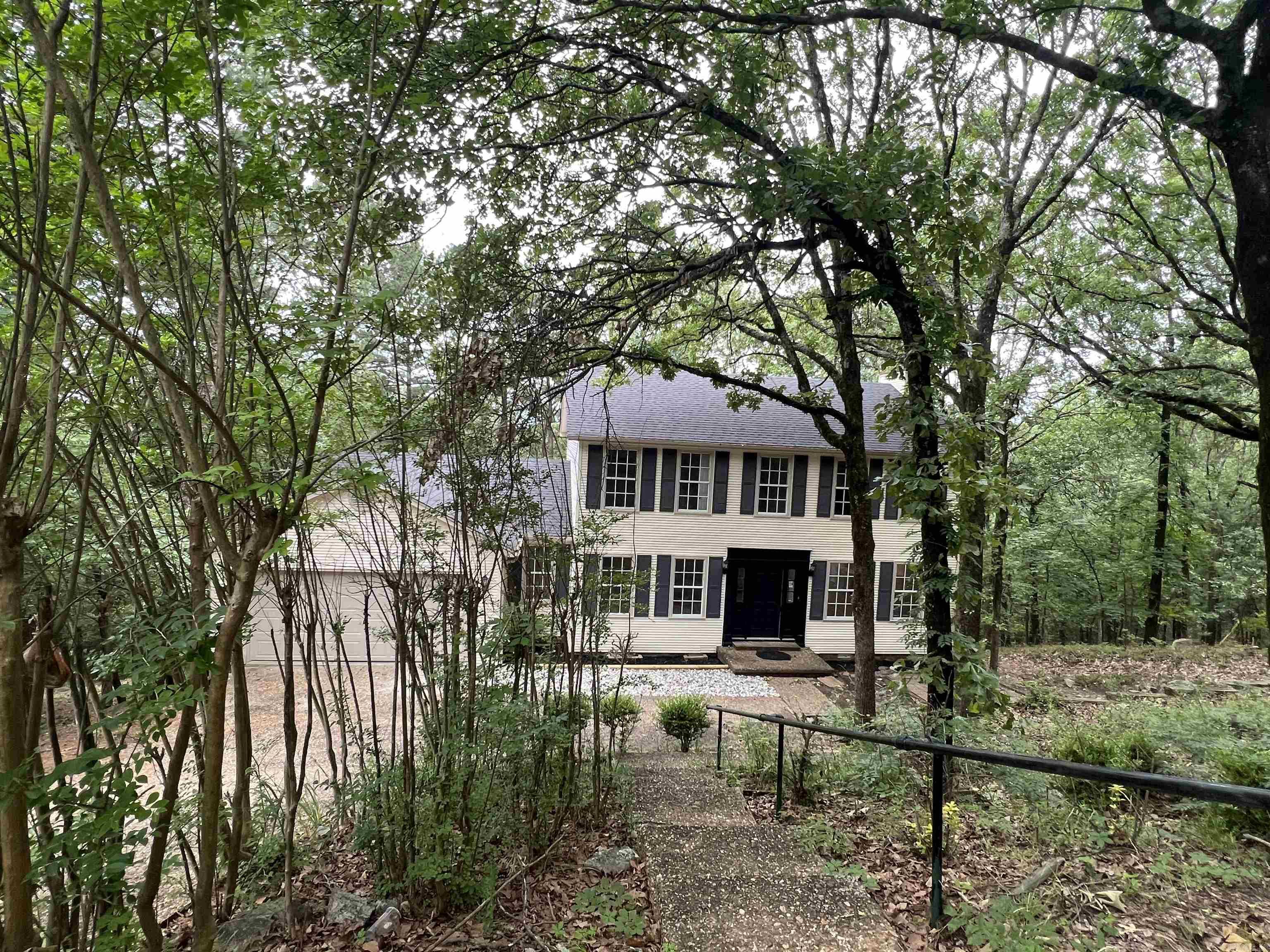 OWNER FINANCING AVAILABLE!!!  Lovely fully updated home located in the heart of West Little Rock situated on a beautiful wooded nearly one acre (0.92) lot.  With three bedrooms, and two and half bathrooms, formal dining/flex space, oversized family room, breakfast room/office space, bonus room off the back of the garage, and nicely appointed kitchen this home is ready for its new owner.  NEW roof, HVAC (2 two-ton units), furnace, hot water heater, carpet, LVP (50 year warranty), paint, quartz countertops, expanded deck, appliances and much more. NO SELLER PROPERTY DISCLOSURE AVAILABLE