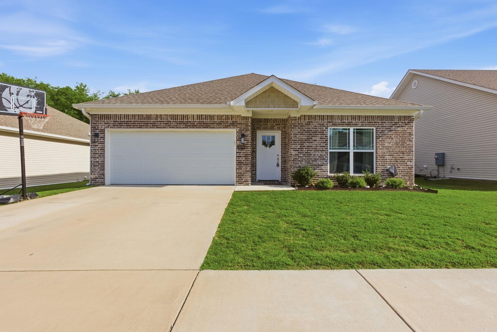 Welcome home to this stunning 4 bed, 2 bath home sits in the heart of Bryant, just minutes from I-30 access. From the moment you step inside, you are welcomed by an impressive open floor plan designed for comfortable living and effortless entertaining. The luxurious kitchen features granite countertops, a large island, stainless steel appliances, and a spacious pantry for added convenience. The split floor plan maximizes functionality while showcasing beautiful finishes throughout. Enjoy luxury vinyl plank flooring and recessed lighting across the entire home, creating a modern and cohesive feel. The 2-car garage includes keypad entry, along with generous floored attic space for additional storage. The guest bathroom offers a tub-shower combo and a double-sink vanity with ample storage. Step outside to relax or entertain on the oversized covered back patio, perfect for enjoying the outdoor space. Located near a variety of local amenities! Schedule your showing today!