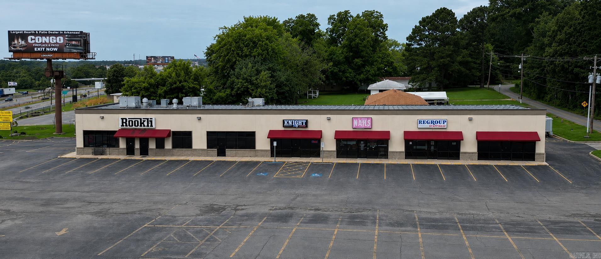 Prime I-30 frontage investment property in Bryant, AR. Fully occupied with 100% occupancy and additional billboard income. Excellent visibility, strong traffic counts, and convenient access make this a rare opportunity to acquire a stabilized, income-producing asset in a rapidly growing market.