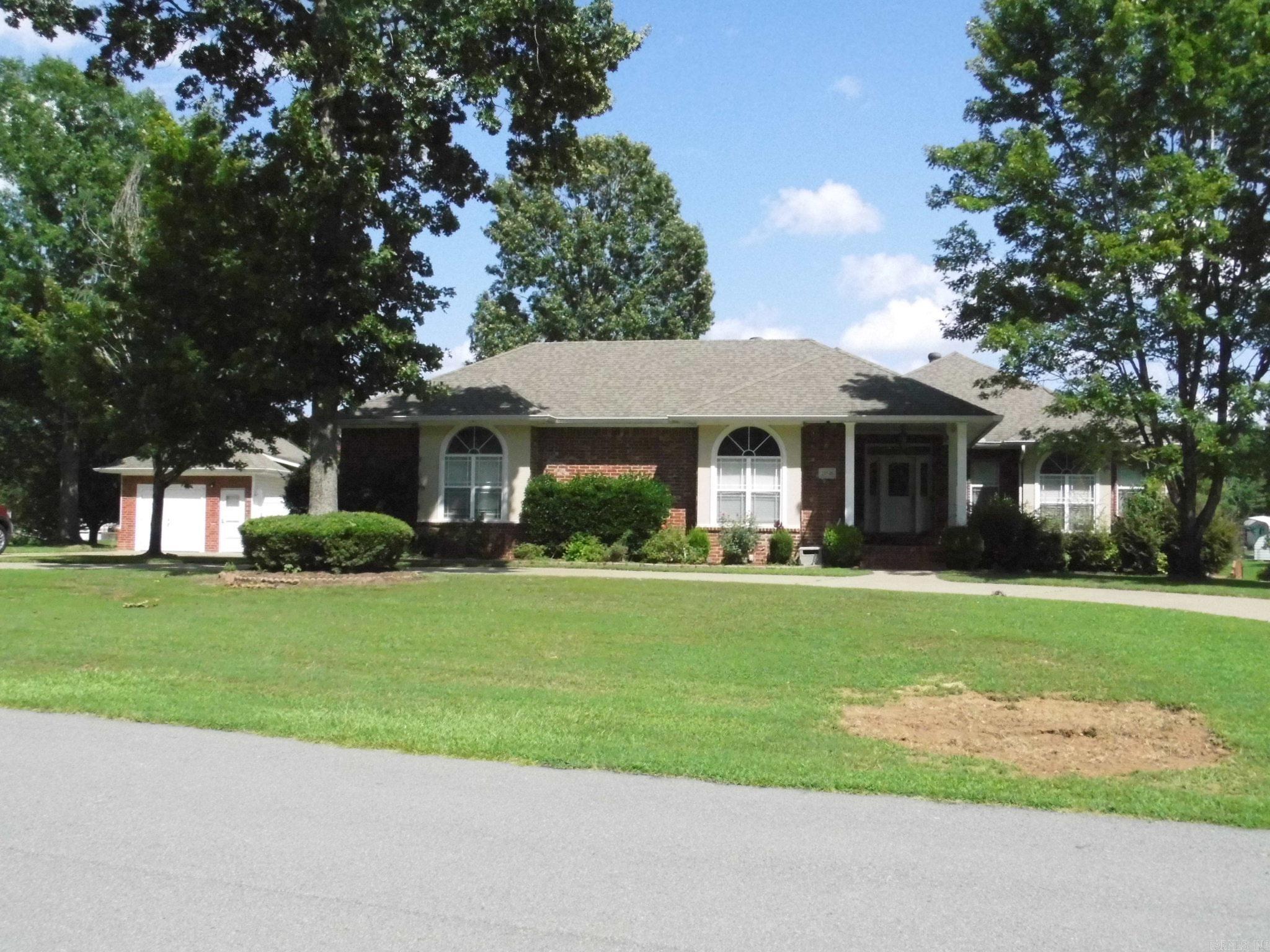 **WOW**Spectacular 3700 sf brick home sitting on private lake**Lakeview with your own covered dock**In-ground pool**Poolhouse with full bath**Covered porch overlooking pool is great for entertaining**5 BR's, 4 BA's**Large master suite features recently updated master bath with walk-in closets, walk-in shower, soaking tub and flooring**2 of the bedrooms & 1 bath are located on lower level which also has a living room w/electric FP, kitchen/dining area, laundry room, & walk-in closet that doubles as a Safe Room**Lower level has it's own driveway, carport and private entrance**Fabulous in-law qtrs or would be a great rental unit**Sheridan Schools but only 10 minutes to downtown Little Rock**