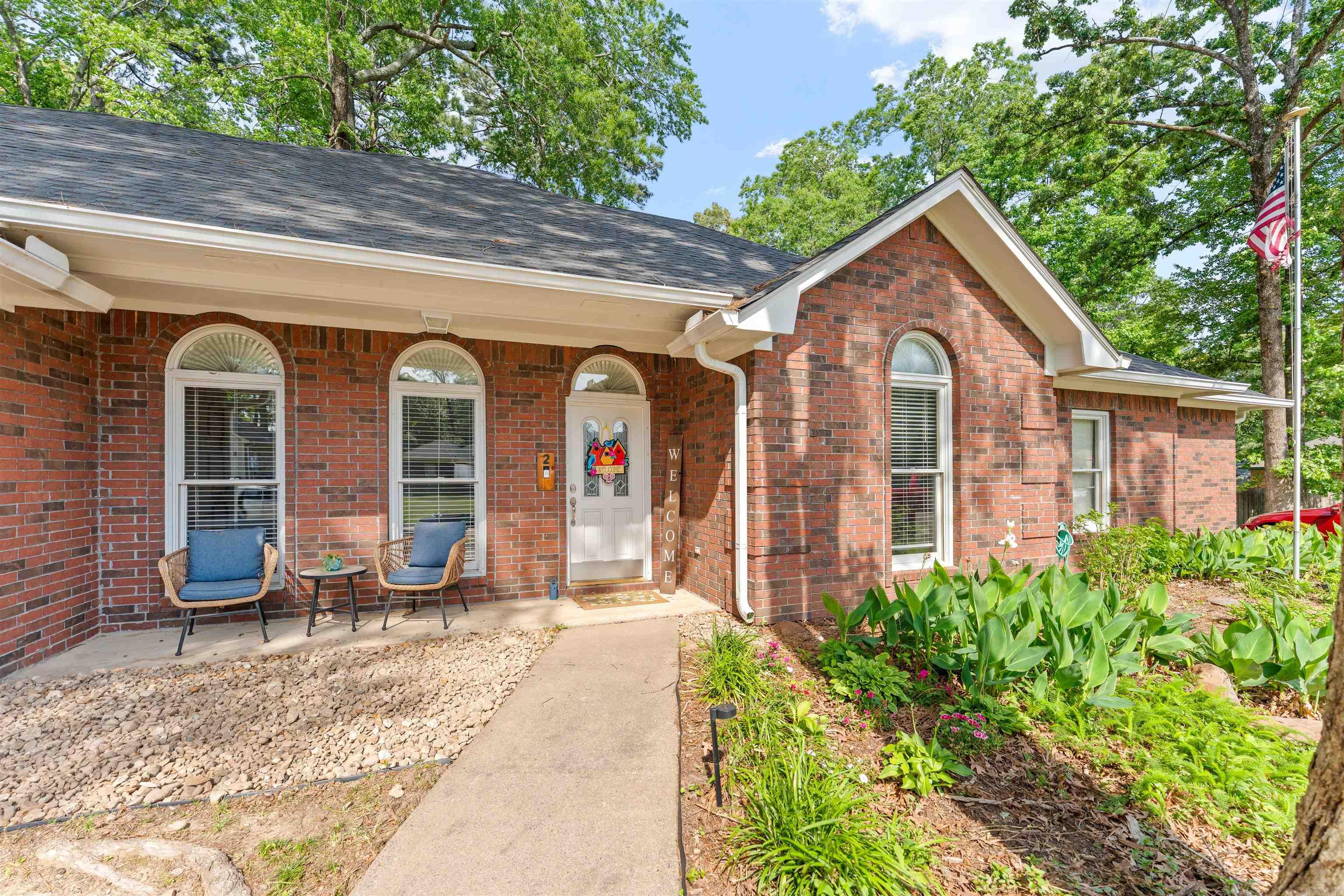 This is a beautiful 4 bed, 3 bath home tucked on a quiet cul-de-sac in Maumelle. Here, you’re just minutes from outdoor favorites like Lake Willastein Park, Lake Valencia Park, and miles of scenic hiking trails—perfect for enjoying the outdoors while staying close to everything. Conveniently located between Little Rock and North Little Rock, you’ll have quick access anywhere in Central Arkansas.  At the entry, a flexible office sits to the left with fresh paint and updated fixtures, while a formal dining room to the right features decorative molding and updated lighting.  The kitchen offers stone countertops, tile backsplash, custom cabinetry with rollouts, farmhouse sink, stainless appliances, and a double oven. A bright eat-in area with bay windows and French doors fills the space with natural light.  The main living area features tall ceilings, a wood-burning fireplace, and large windows overlooking the backyard.  The primary suite includes bay windows and a renovated en-suite with a custom shower. Two additional bedrooms plus a guest suite provide plenty of space.  Enjoy an oversized backyard with a deck, built-in seating, garden area, shed, plus RV access and hookups.
