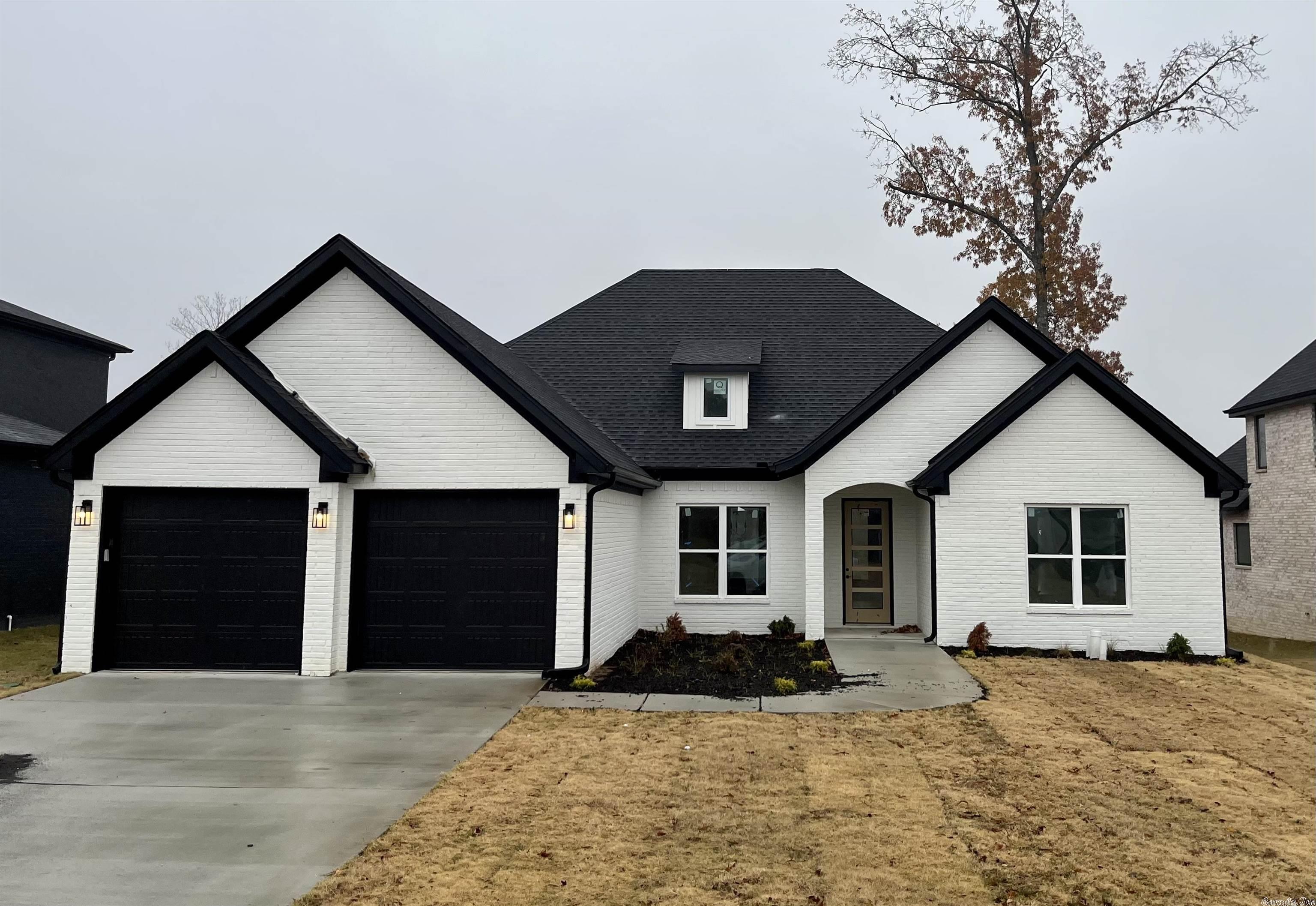 Beautiful New Construction Home with lots of extras.  This home offers 2310 sq ft, 4 bdrms and 2 baths, open kitchen with large island, rock fireplace, large walk in pantry, large primary with on suite w/ walk in shower & huge closet.  Tons of extra custom features! Great house with a great neighborhood.