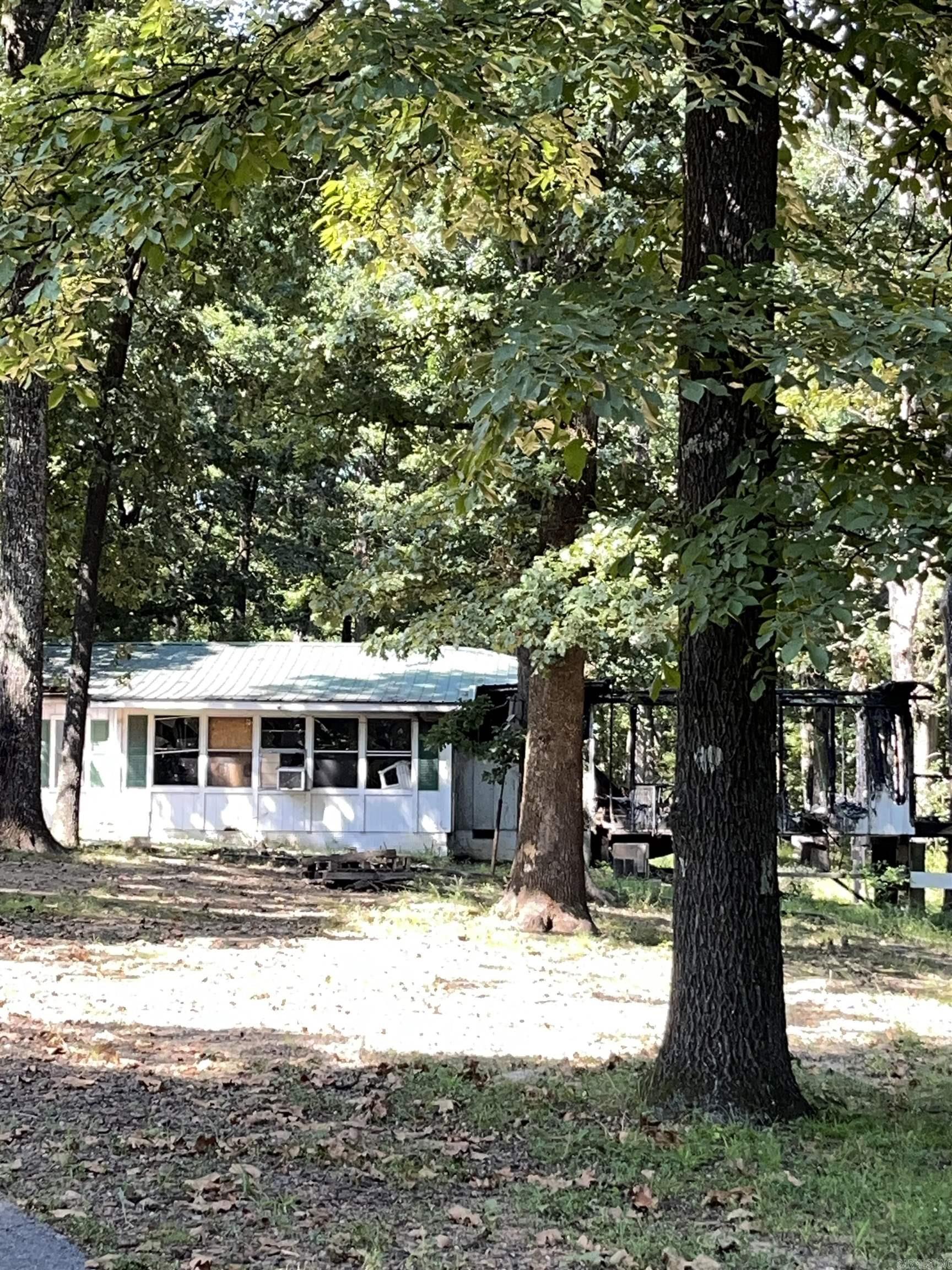 Call your favorite Agent to setup a time to view the property. Just a reminder, house has been burned and could be hazardous, do not go without your agent. Owner will not be responsible for injury because the house is half burned. Value is in the land and the hookups for the utilities