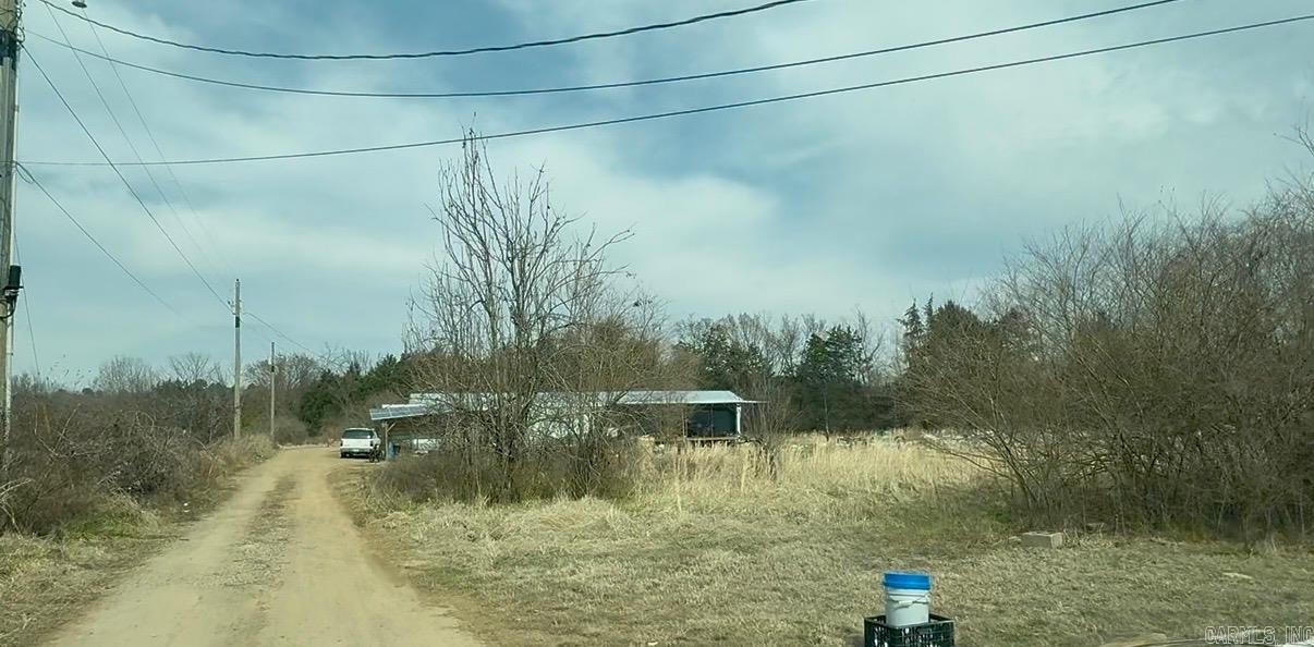**Investment Opportunities**  Great opportunity for investors or buyers looking for rental income potential.  2.5-acre tract with 3 existing manufactured homes each with separate septic, power poles, wells as well as registered separate mailing addresses for each. Utilities available for a fourth. Whether you are looking to renovate and rent, place new homes, or hold as income-producing property, this setup offers flexibility and upside. Priced with condition in mind and ready for someone willing to put in the effort. Solid opportunity to add to your rental portfolio.