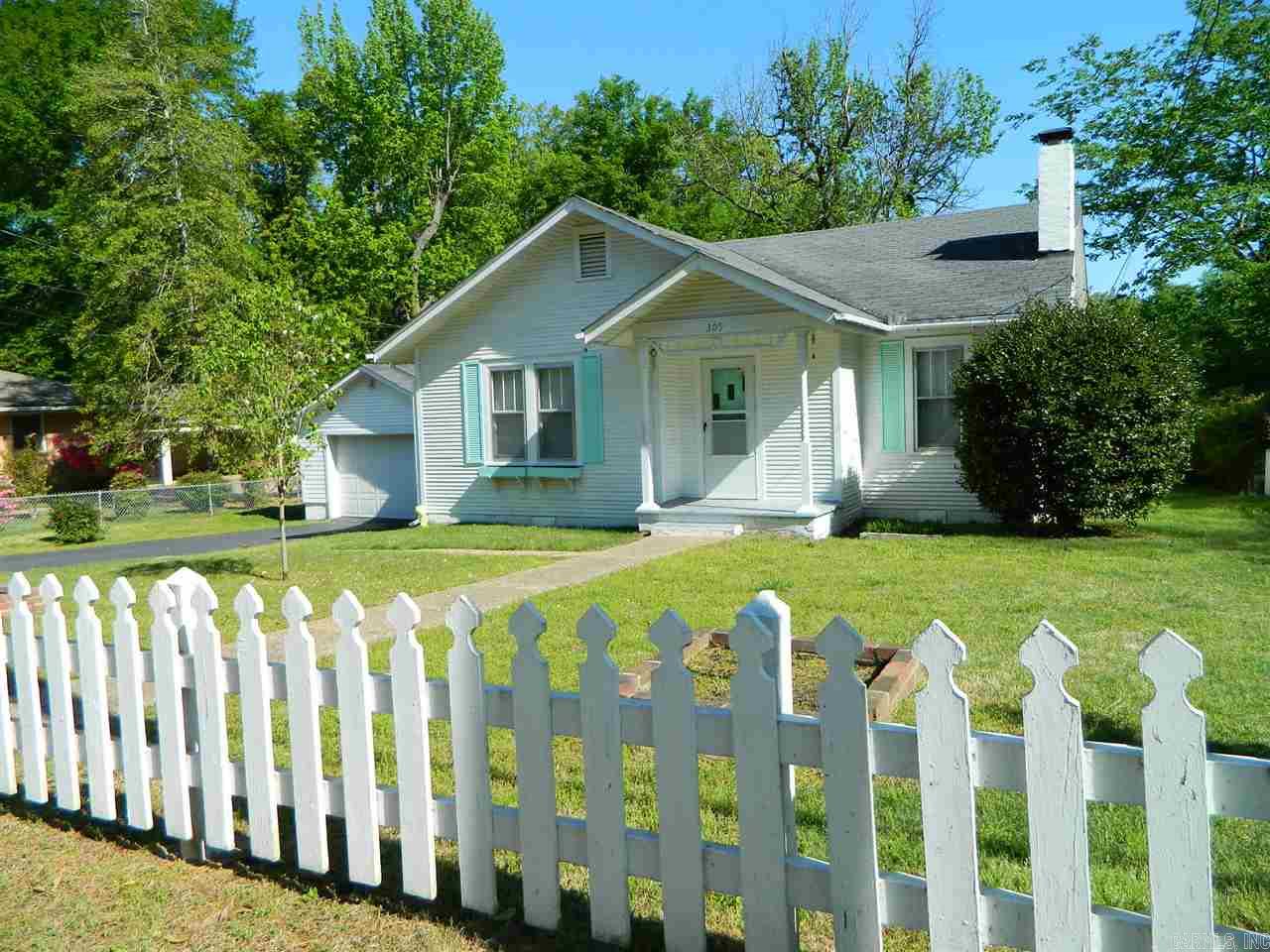 Amazingly well kept home in the heart of Benton!! The original hardwood flooring throughout the home is even in great shape! You'll enjoy the spacious fenced lot including a large back deck, a garage with attached shop and storage shed. Trane HVAC installed in 2004 and maintained yearly by Jones Air-  WILL NOT LAST LONG