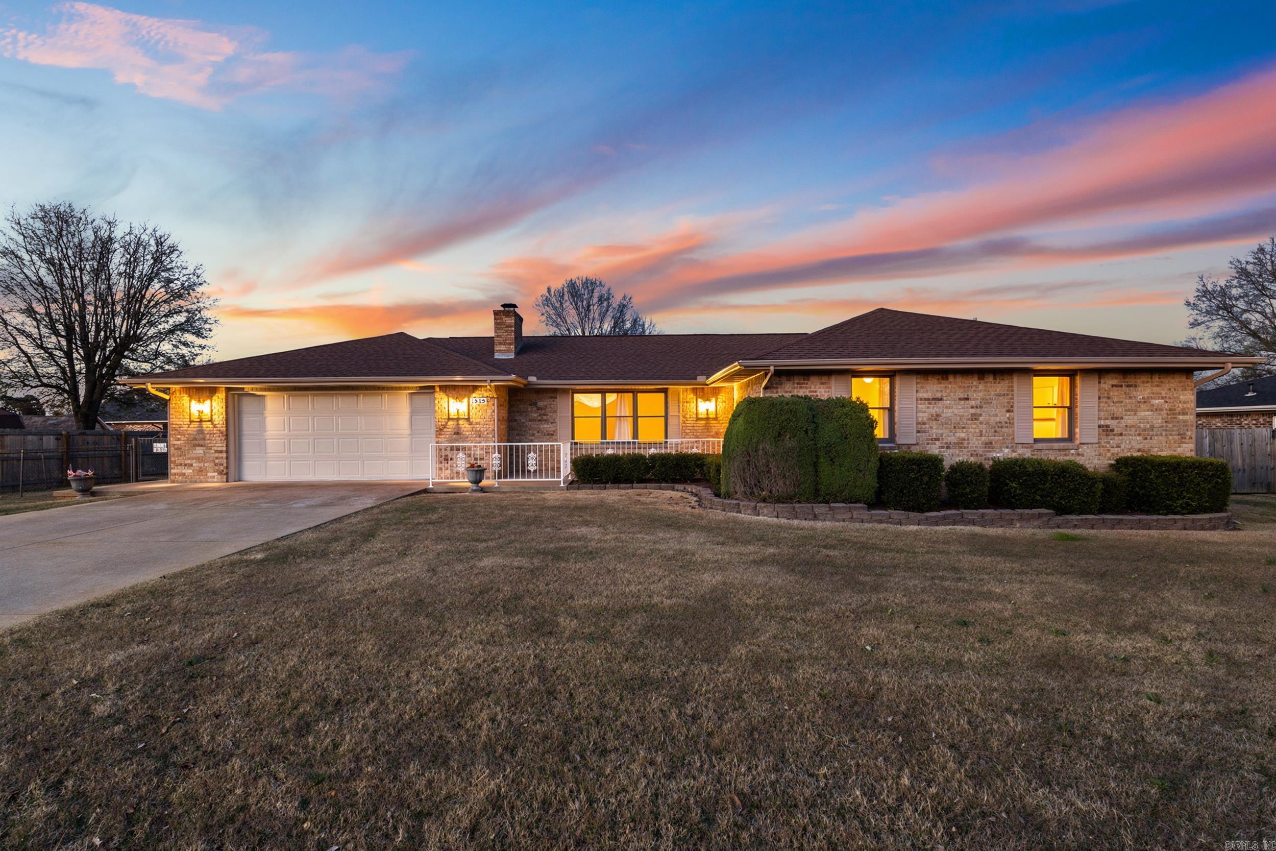 Welcome to 1515 Pine Tree Lane in Mountain Home, Arkansas, located in the desirable Southern Meadows subdivision. This all-brick 3-bedroom, 2.5-bath home offers comfort, functionality, and timeless appeal. Inside, you’ll find a spacious layout featuring a cozy gas fireplace, a dedicated bonus room or office space, and a heated and cooled sunroom—perfect for year-round enjoyment. The kitchen and living areas flow seamlessly, making everyday living and entertaining easy. Step outside to a covered back patio overlooking a level, fenced yard ideal for pets, play, or relaxing evenings. Additional highlights include a 2-car garage and well-maintained landscaping. Conveniently located near local amenities, shopping, and Baxter Health, this home offers the perfect blend of comfort and convenience in the heart of the Twin Lakes area.