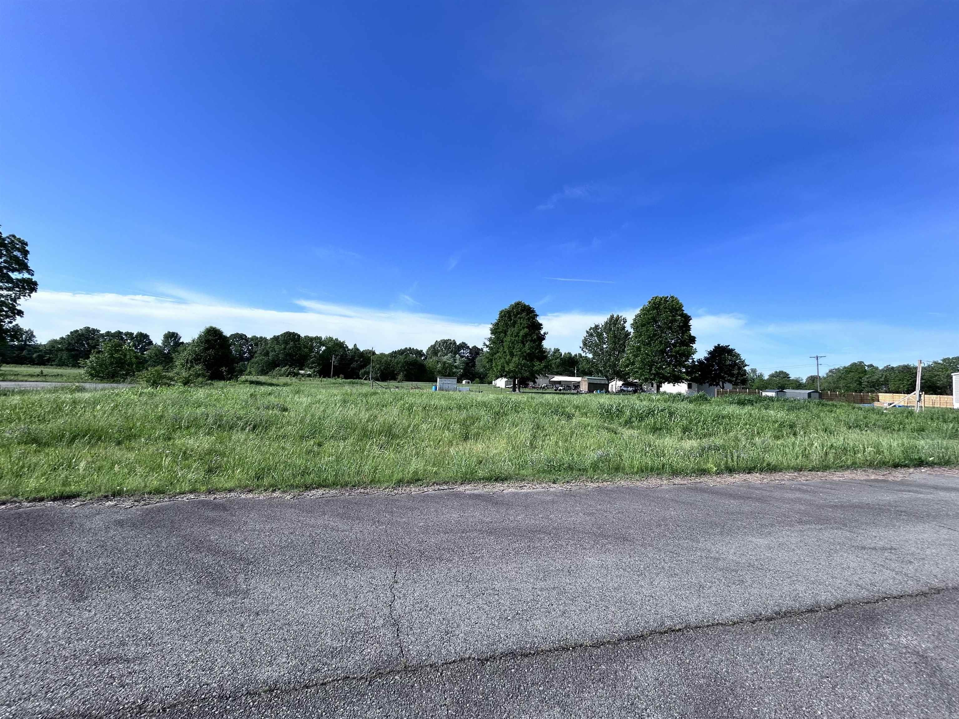 Building a new home, placing a mobile home, or buying land for the future are all great options with this level lot located in the city of Beebe. Mobile homes are allowed, and electric, water, and sewer are available at the street. The lot is level and easy to work with, making it simple to plan your next steps. Located in town, this property keeps you close to local schools, shopping, restaurants, and everyday needs. Whether you are ready to build, need a spot for a mobile home, or want an investment property, this lot has plenty of potential. Bring your plans and make it your own.