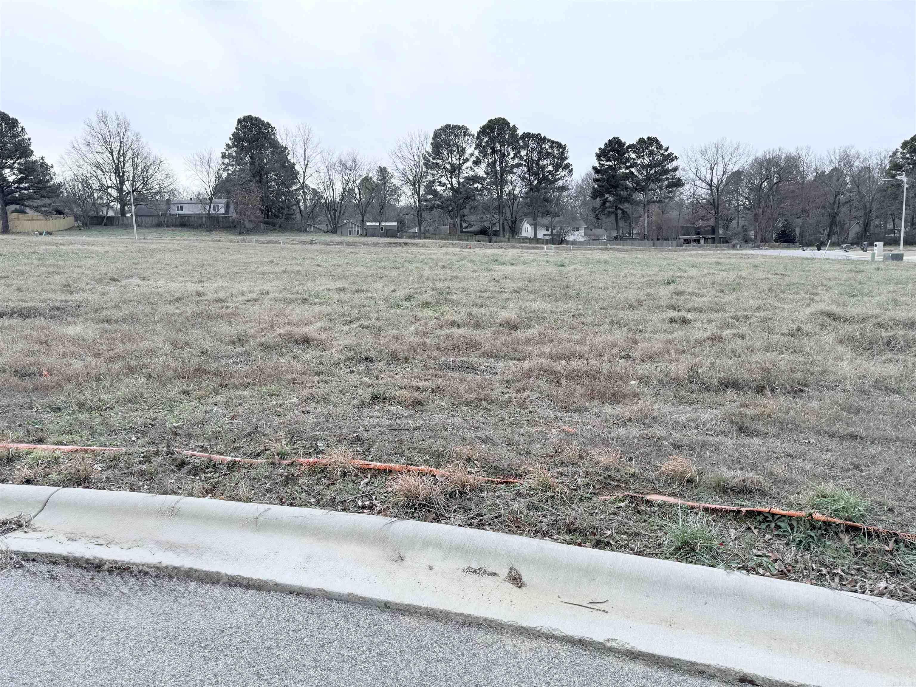 Level 0.27-acre lot in Creekwood Addition, southwest Jonesboro. Easy to build on with a clean, flat layout, located in a growing subdivision with newer homes and convenient access to local amenities. Ideal for your custom home.