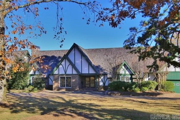 Spectacular Tudor style home situated on 2.76 acres with panoramic river views year around.  Beautiful hardwood floors, tall ceilings and neutral decor.  Exterior decks and grounds need some updating.  This family home has pool, putting green, workshop and 4 car garage.  Large basement area and gymnasium not included in the square footage.  Wonderful opportunity for this amazing property.