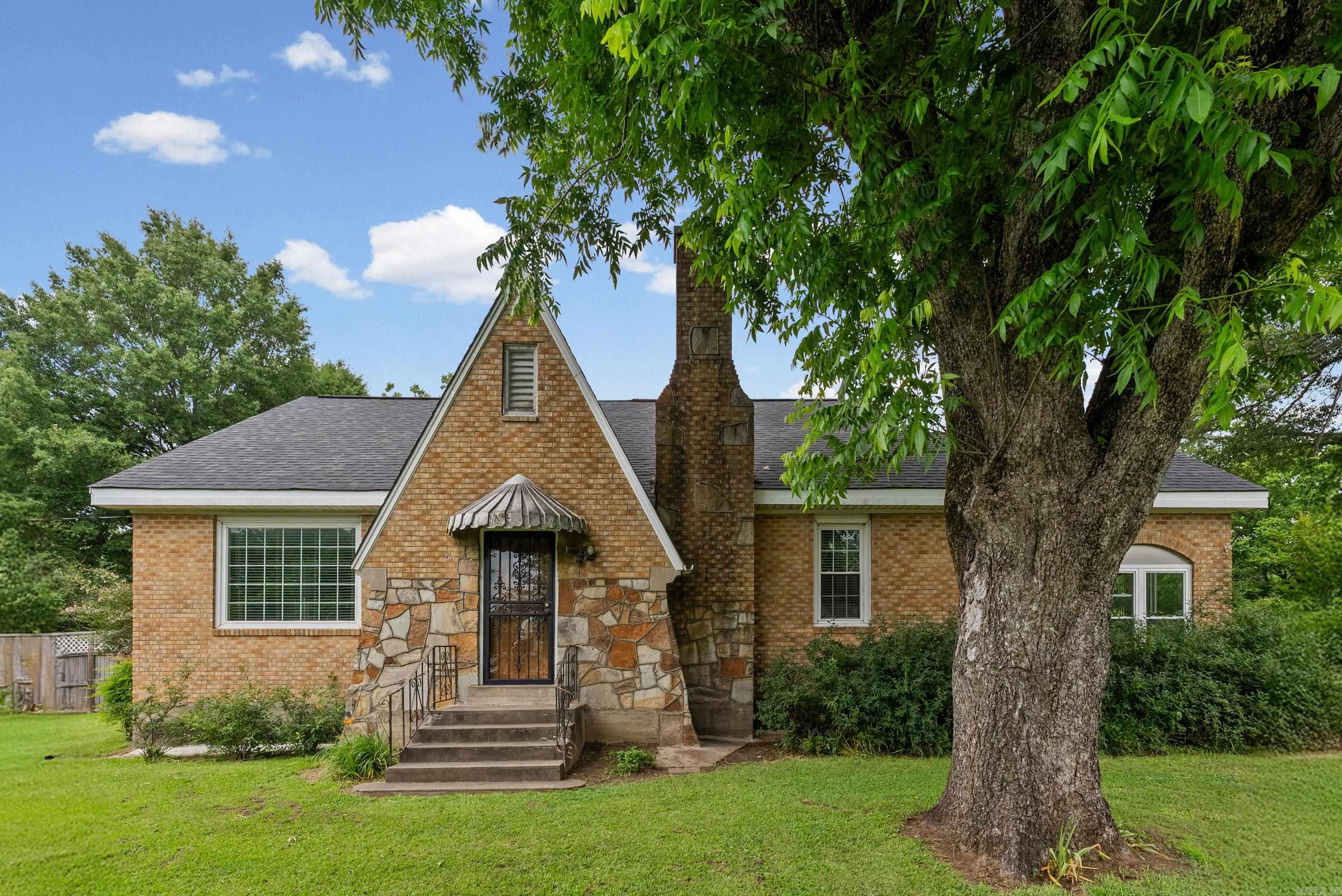 This charming home is full of character & timeless appeal, featuring beautifully refinished original hardwood floors & an abundance of natural light throughout. On the main level you will find a large living space with gas fireplace, a separate dining room with built-in hutches, large eat-in kitchen with ample storage, a grand hallway, 3 bedrooms, a newly updated full bathroom, and two guest bedrooms with a full bathroom in-between.  The basement & floored attic that covers the entire length of the home, provides sufficient space for handy work, piddling & storage.  Situated on 2.12 beautifully landscaped acres, this property is a true outdoor retreat.  The established garden area is ideal for growing your own vegetables, while the chicken coop adds a touch of country living and homestead potential.  During the warmer months, cool off in the above-ground pool or entertain in the peaceful outdoor setting. The bright & airy sunroom also provides a great place to relax. Offering the perfect blend of charm, functionality, and outdoor beauty, this unique property provides a rare opportunity to enjoy country-style living while still being conveniently located to anywhere in town.