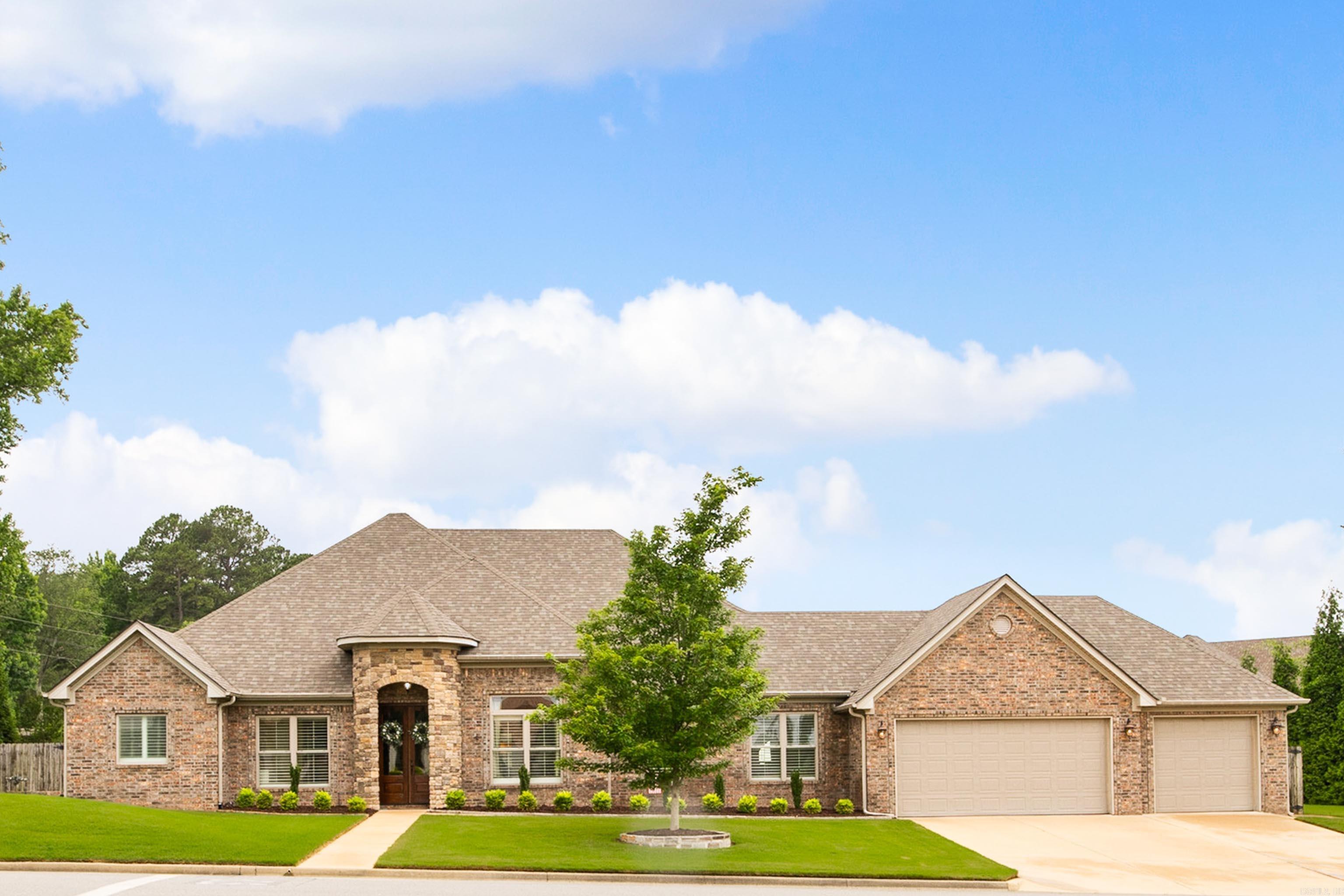 This one-owner custom-built home in Hurricane Lake Estates showcases comfort and craftmanship throughout, with a backyard designed around a 25x50 saltwater pool (brand new liner), plus a water slide and diving board. Set on 1.44 acres, this 2648 sq ft, 3 bed 2 bath home offers a thoughtful layout with open connection where you want it and defined spaces where you need them. Natural light fills the home through abundant windows, highlighting plantation shutters, hardwood floors, and detailed trim work. The kitchen offers a beautiful gathering space with custom cabinetry, double wall ovens, and a butler's pantry with a warming drawer. Just off the kitchen, the hearth room lets you enjoy the fireplace while staying connected to the kitchen. The main living area features built-ins and a wood burning fireplace, while the dining room is elevated with a coffered ceiling. From the main living areas, you can enjoy a pretty view of the nearby lake. The primary suite feels bright and oversized with abundant windows overlooking the backyard, and a spa-like bathroom you will thoroughly enjoy. Outdoor living includes screened-in porch, hot tub and plenty of grassy spaces for added fun.