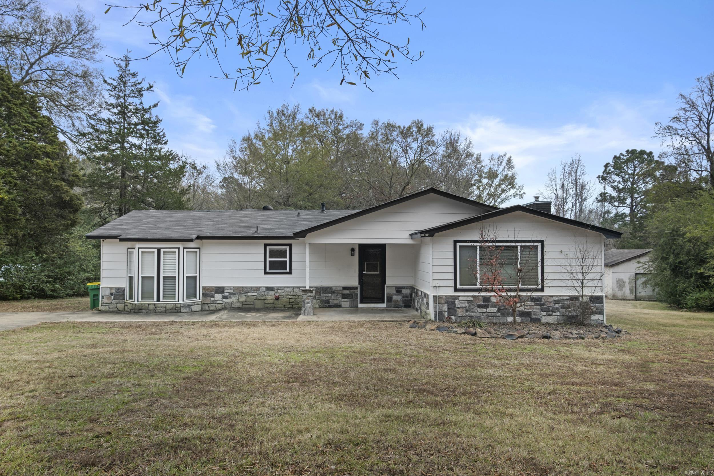 Are you looking for a home just outside of town that has it all? Updates throughout, a large shop, plenty of room to spread out, and tons of charm? Look no further! This 1,510 sq ft home offers 3 bedrooms, 2 full bathrooms, and a versatile bonus room perfect for an office, hobby space, or additional living area. Recent improvements include brand-new flooring throughout, fresh interior paint, and a new HVAC system installed in May 2025.  The property sits on 0.71 acres and is partially fenced, providing space for enjoying the outdoors, animals, or additional parking. A 20x20ft shop adds extra storage, while the Impressive larger 30x90 ft shop features a painting booth with ventilation, making it ideal for automotive work, projects, hobbies or business use. Located just minutes from Little Rock Air Force Base this move-in-ready property offers the perfect balance of rural living and everyday convenience. Schedule your showing today!