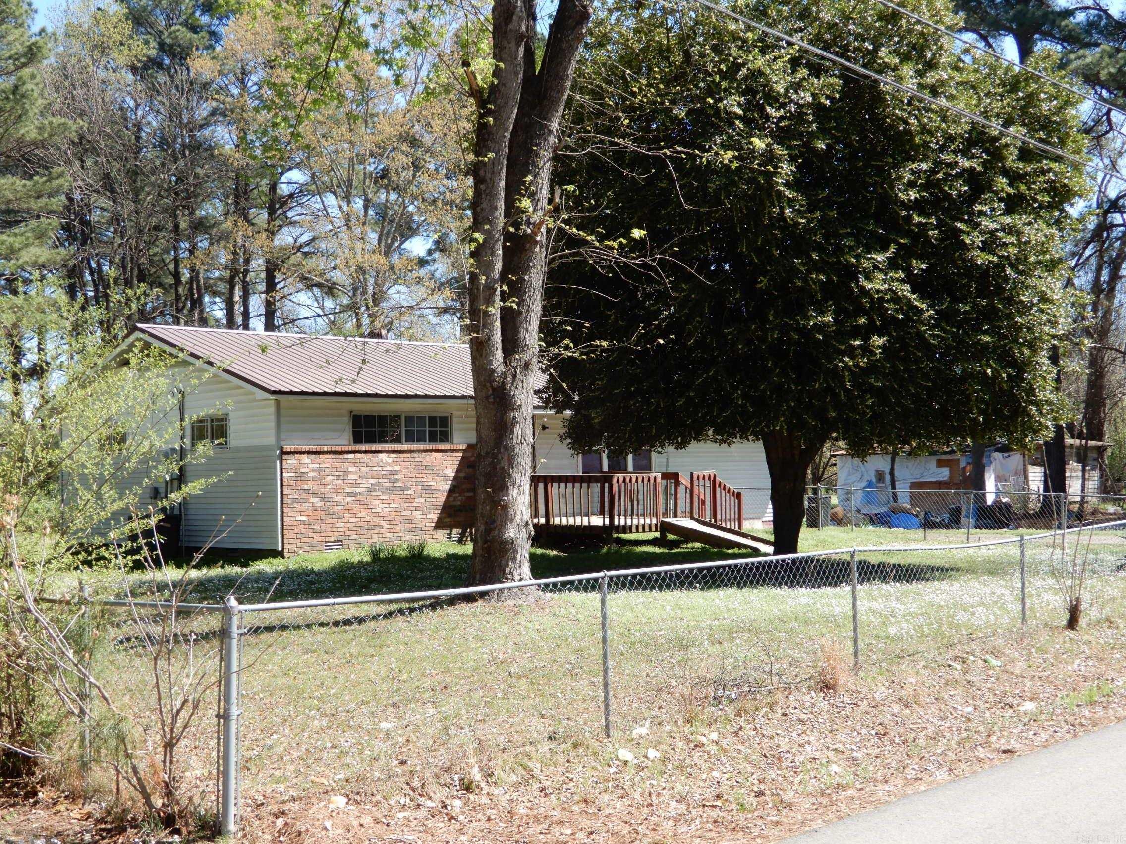 possibilities with some TLC home could be a nice rental or even a family home. Home has lots of big rooms and a large, fenced back yard. With a short drive to Searcy home is conveniently located.