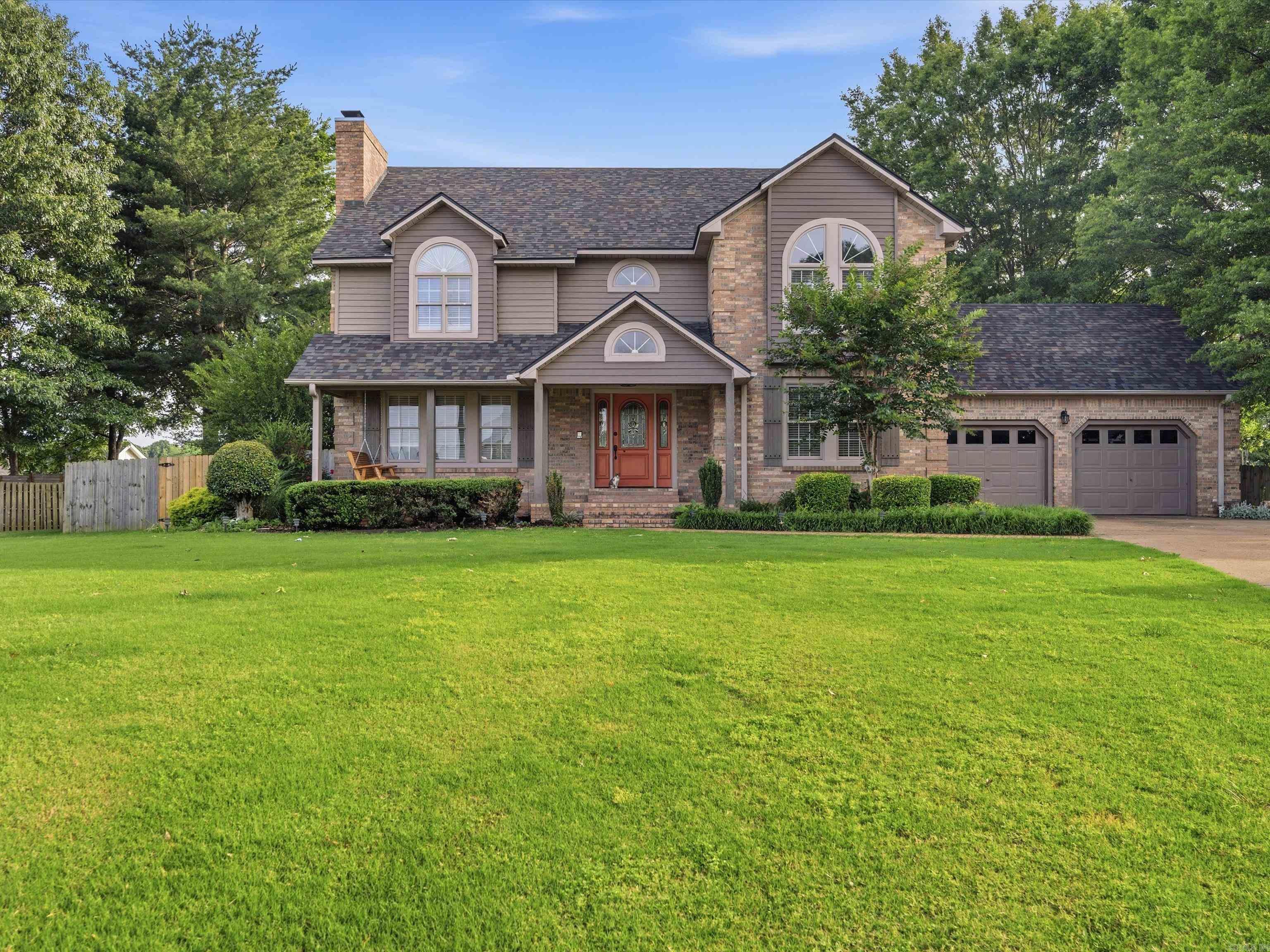 Welcome to this one-of-a-kind custom-built home in desirable Park Ridge Estates. Offering 3,006 square feet of living space, this spacious two-story home features multiple living areas, a formal dining room, and a spacious kitchen. Also included on the main floor is one bedroom and a half bath.   The formal living room and oversized primary suite both include beautiful log-burning fireplaces. A stunning spiral staircase leads upstairs to the private bedroom quarters. The primary suite offers a large closet, walk-out balcony access, dual vanities, separate shower area, and a garden tub surrounded by stained glass accents.  The roof was replaced in 2024. The home features two separate HVAC systems for upstairs and downstairs, and a 50-gallon electric water heater. Additional amenities include a whole-house vacuum system, laundry room with sink, two-car garage, gutters, two decked areas, and a detached shed with a concrete floor and electricity.  This home offers exceptional space, charm, and functionality in one of Paragould’s established neighborhoods. A rare opportunity to own a distinctive custom property with features and character you simply won’t find in newer construction.