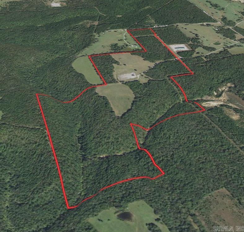 Creeks, pastures, timber, springs, roads, trails and fences…All desirable attributes associated with this northern White County tract.  For the first time since its acquisition in the 1960's, this property is available for purchase.  A lot of work has gone into the improvement of the land giving you a tremendous starting point towards your own enjoyment and development of this 203+/- acres of ground. Fourteenmile Creek runs through the west side of the property, north to south, for right at one half of a mile.  Its waters are beautiful and dotted with a mix of deep pools and shoals.  Several good rope swing trees were noted along with fish and all the other wildlife you’d expect to see in a healthy year round creek. Traveling through and around the property is convenient on its trail system, giving you access to all but the steepest sections of the big wooded hillsides.  These hills shelter and protect the creeks, are covered in some really nice mast bearing hardwoods and home to a very unique cave site. The pastures have been well maintained. This is not a ragged old farm in need of repair.  This is a show piece built for work, play and general enjoyment of what God has created.