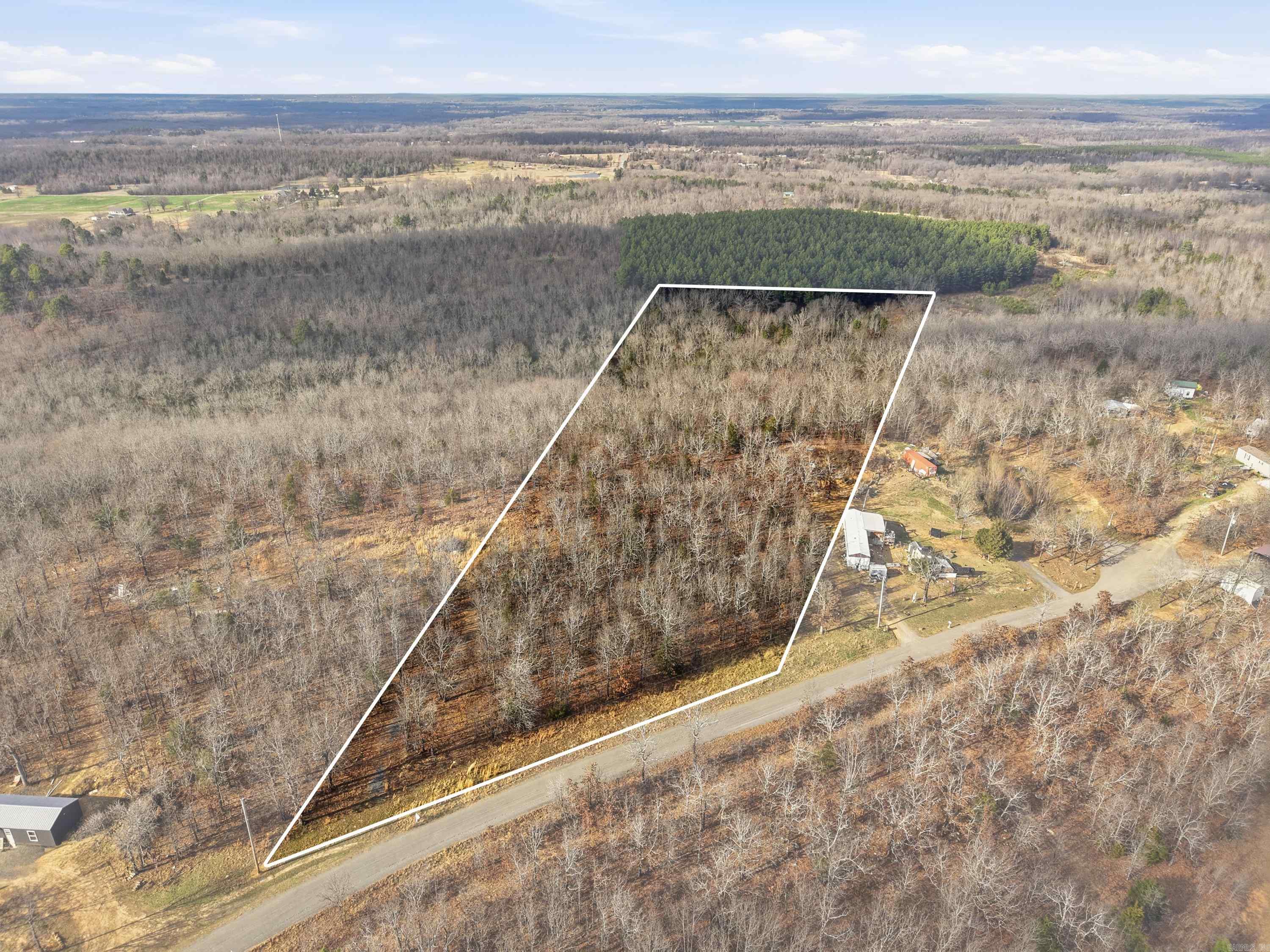 Nestled just outside city limits, 7.04 acres located in Central Arkansas offers the perfect balance of privacy and convenience. No restrictions and utilities available. Plenty of space to build a home, place a mobile/manufactured home, or even create your own private retreat. Enjoy that country living while just being minutes away from Conway, Little Rock, North Little Rock, Vilonia, and Mayflower.