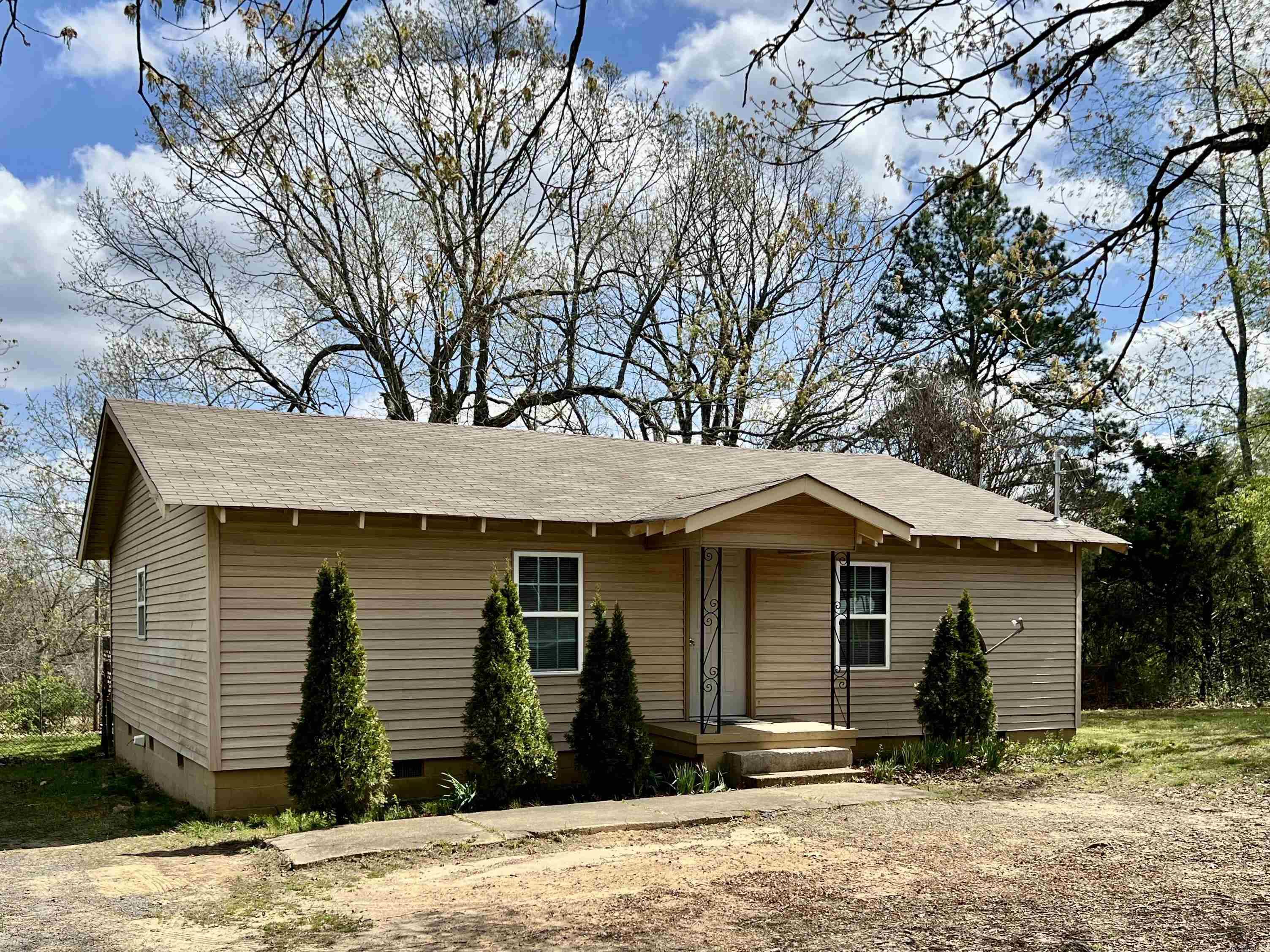 Charming 2 Bedroom 1 Bath cottage on 2 acres! Fresh interior paint gives this home a bright, move in ready feel. Plenty of room to spread out. Ideal for a small homestead, hobby farm, gardening, or just enjoying the outdoors.  Affordable country living with charm and potential. Electric recently upgraded to  200 AMP service and new attic insulation was also installed.