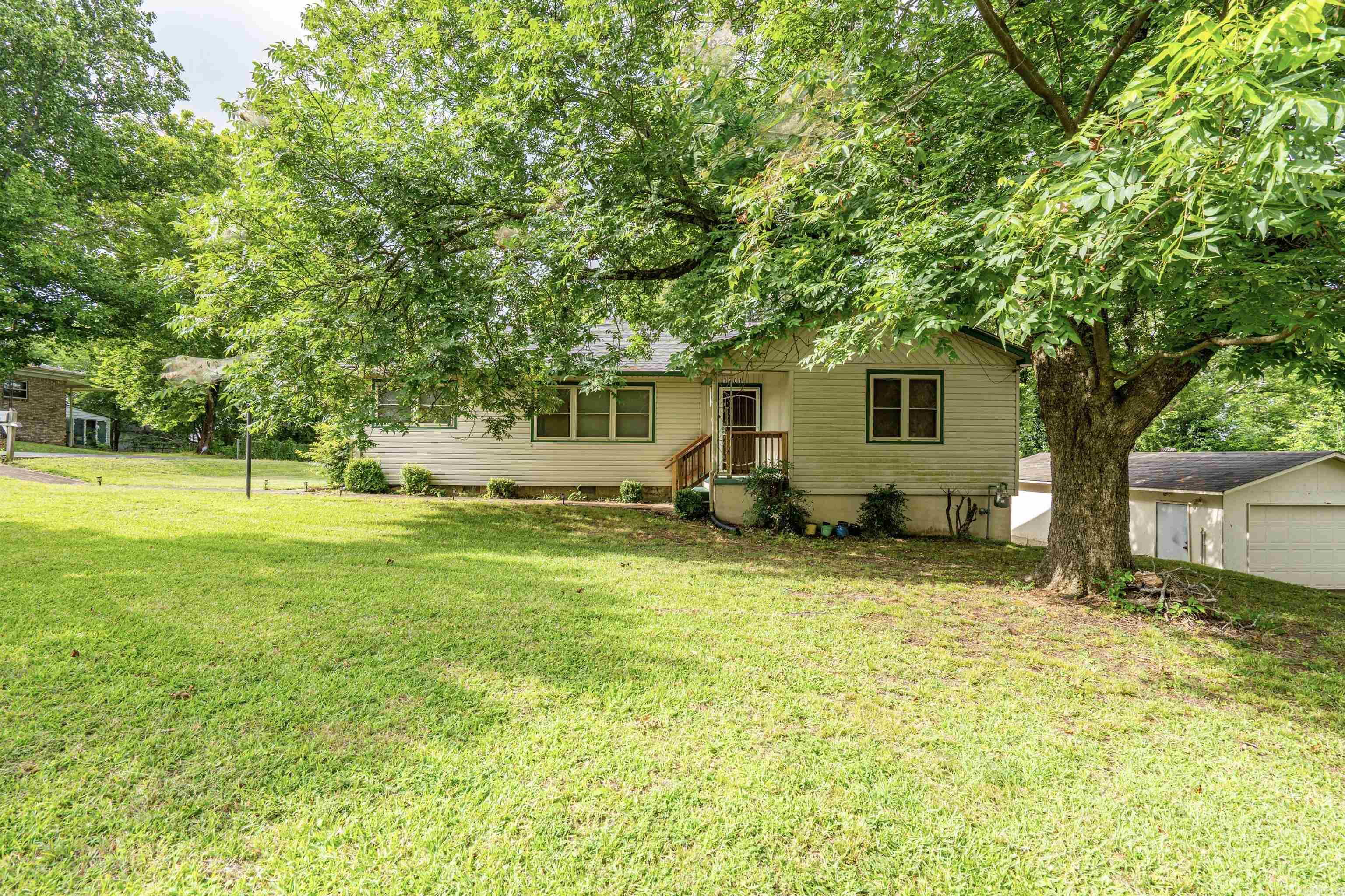 Don't miss this well maintained home situated on three oversized corner lots in the heart of Hot Springs! This home has 3 bedrooms, 1.5 bathrooms, a dedicated office, and a full basement. The inviting main level features comfortable living spaces filled with natural light, while the walk-out basement offers endless possibilities for a second living area, game room, home gym, or guest suite. Whether you're working from home or need extra room for hobbies, the additional office is a valuable bonus. Conveniently located just minutes from shopping, restaurants, parks, and all the attractions of Hot Springs, this property offers the perfect combination of character, space, and convenience. Roof Replaced in 2024. See Agent Remarks