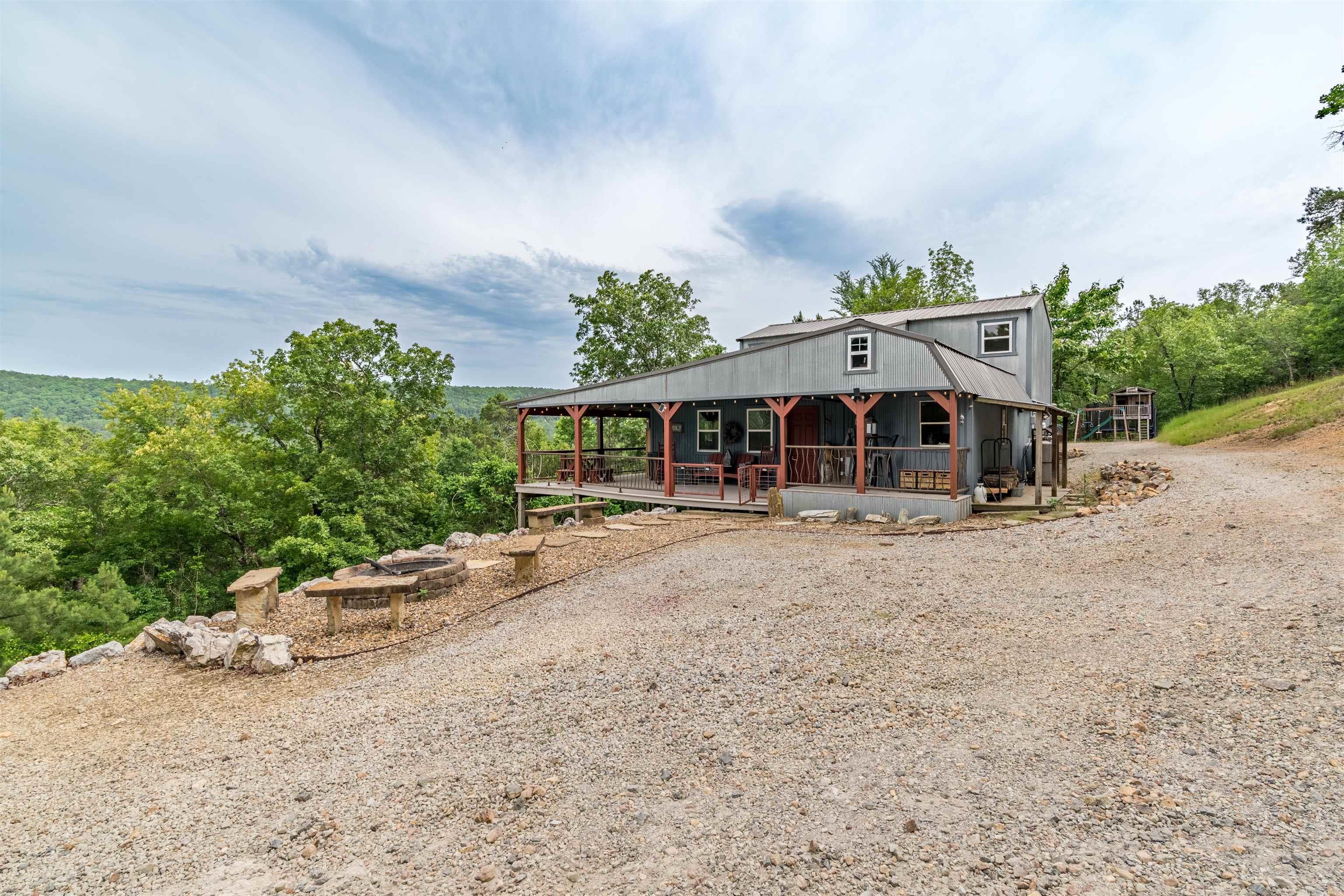 Perched on 21 beautiful acres with breathtaking Mountain Views, this hidden gem offers the perfect blend of privacy, nature, and comfort. Located in the sought-after Fountain Lake School District, this property is a rare opportunity to own your own peaceful retreat.  This home is move-in ready for its next owner! Relax and take in the stunning scenery from your back porch, where you can enjoy peaceful mornings and beautiful sunsets overlooking the mountains.  For outdoor enthusiasts and wildlife lovers, this property is a dream! Enjoy abundant wildlife and hunting opportunities, complete with 3 bear-proof deer feeders already in place and a watch tower to keep you safe when your in the Mountains. Don’t miss your chance to own this one-of-a-kind mountain-view property!