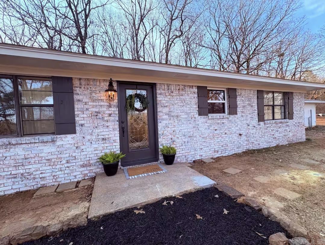 Escape to the beauty of the Ozarks with this fully renovated 4-bedroom, 2-bath home located at 15061 N Hwy 23 in Ozark! Currently operating as a successful Airbnb, this property offers endless possibilities — continue the thriving short-term rental business, enjoy it as your personal residence, or create the perfect private retreat.  Conveniently located just a short drive from I-40 along scenic Highway 23, also known as the Pig Trail, this property combines peaceful surroundings with easy access. The home has been completely renovated and is truly move-in ready. Sellers are offering a new roof and new window allowance, while everything else has already been beautifully renovated. Selling furnished is also a possibility, making this an incredible turnkey investment opportunity.  The property also features a detached shop/garage, offering additional storage, workspace, or recreational possibilities.  Whether you’re looking for a successful income-producing property, a weekend getaway, or a beautiful place to call home, this Ozark property is one you don’t want to miss!