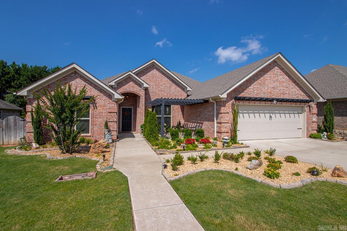 Exceptional 6 year old home in Stoneybrook! Attention to detail is beyond words! This one level beauty has been meticulously maintained and is move-in ready. Stroll through the landscaped front yard to the courtyard & gazebo. The sunlit dining room opens to the great room w/tray ceiling, FP & hardwood floors. A library could also be used as a bedroom. The breakfast area leads to the spacious well-equipped kitchen that has cabinets to the ceiling, huge pantry & granite counter tops. Gas range, microwave, dishwasher & refrigerator. A large laundry room has sink & folding/hanging cabinet. The gorgeous primary bedroom boasts hardwood floor & tray ceiling. An adjoining bath offers a walk in shower, tub & huge closet. Two additional bedrooms share a lovely bath w/double sinks & granite counter top. A great place to hang out all year long is the nice sunroom. Step into the backyard oasis to see all the landscaping & inground salt water pool. For something cool to drink or even popcorn, visit the cabana and sit in the shade for a while. Just about every inch of the grounds is beautifully landscaped. There is even a lower patio w/stone pavers. Don't miss this one! It's spectacular!