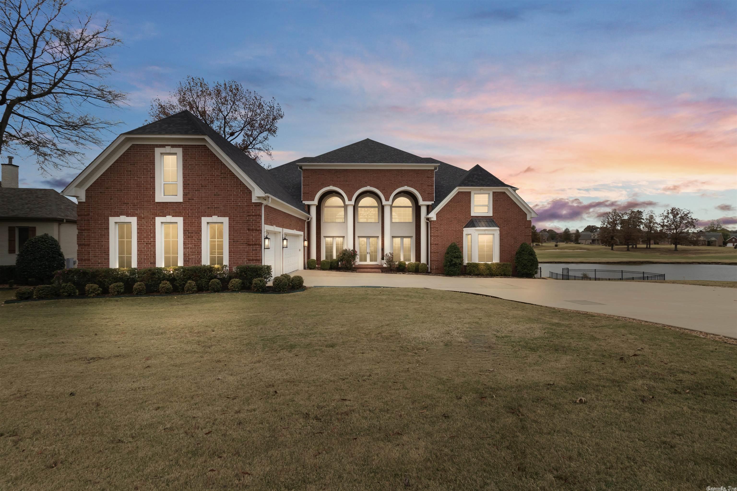 Don’t miss this extraordinary home on the golf course with spectacular views of the water. This stately property combines sophistication, accessible living and an abundance of amenities and LIGHT.  With a brilliant floor plan, whether you have a large family or are empty nesters, this home is perfection. Primary living can take place on main floor w/ no steps and include spacious master suite, library, 2 living areas w/ fireplaces, gourmet kitchen and expansive patio.4 BR/ 4BA w/ living area upstairs, game room, media room, pool, safe room, spa and 2nd kitchen down.