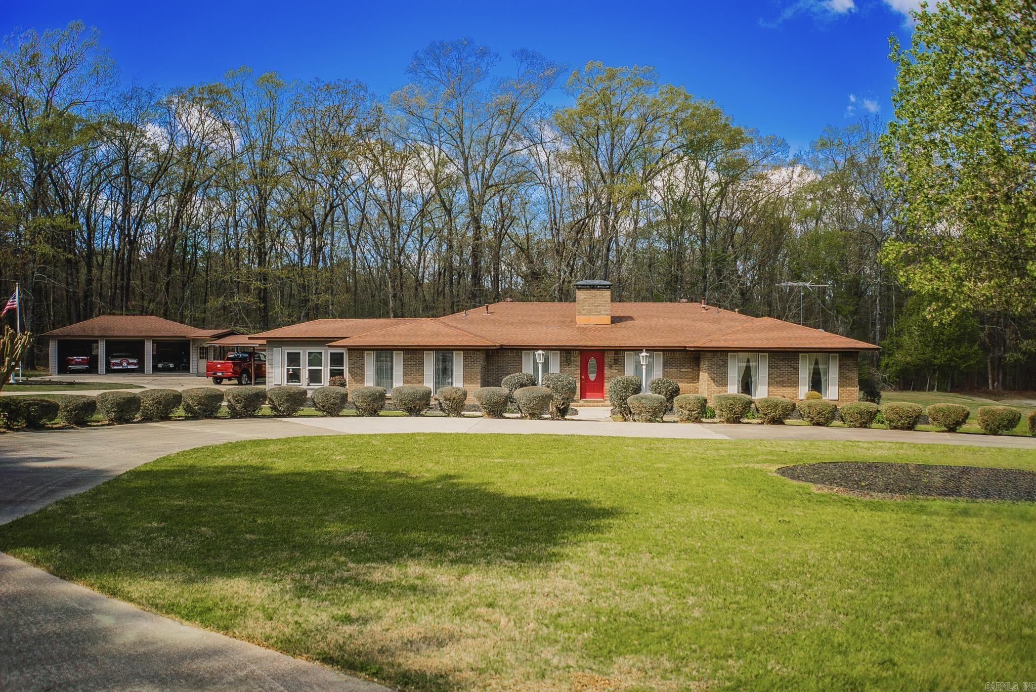 Situated on a quiet circle with easy access to the Monticello Country Club, this spacious one-story brick home offers over 5,000 square feet with 5 bedrooms and 4.5 baths. The home features well-defined living areas that provide generous space for everyday living and entertaining, all on one level.  The backyard backs up to a wooded area, providing privacy with no rear neighbors, and the neighborhood is perfect for walking, whether for leisure or exercise. Outdoor amenities include an in-ground saltwater pool with a recently replaced liner and a cabana with a full kitchen—ideal for gatherings.  The roof, with architectural shingles, was replaced within the last 10 years. Additional features include a three-car garage and a whole-house generator just over two years old, offering comfort and peace of mind. With its size, location, and outdoor living spaces, this property presents a wonderful opportunity to make it your own.
