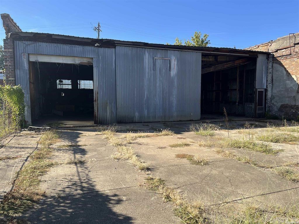 ENDLESS POSSIBILITES! Whether you want to start your next business adventure, or need storage and extra space for a favorite hobby of working on your race cars or ATV's.... this 3000 sq ft commercial style building could be the perfect fit. Spacious floor area, all with concrete- complete with FOUR POST CAR LIFT, tire racks, air compressor, hoist, work tables and more. Need to store your RV, Boat,  Camper, or race car....then be ready to head down to Prescott Race Way, White Oak Lake, or Little Missouri River. Close to Exxon Station, Gurdon schools, Georgia-Pacific, shopping and more. Lots of space to spread out and work on your next project. CALL TODAY!
