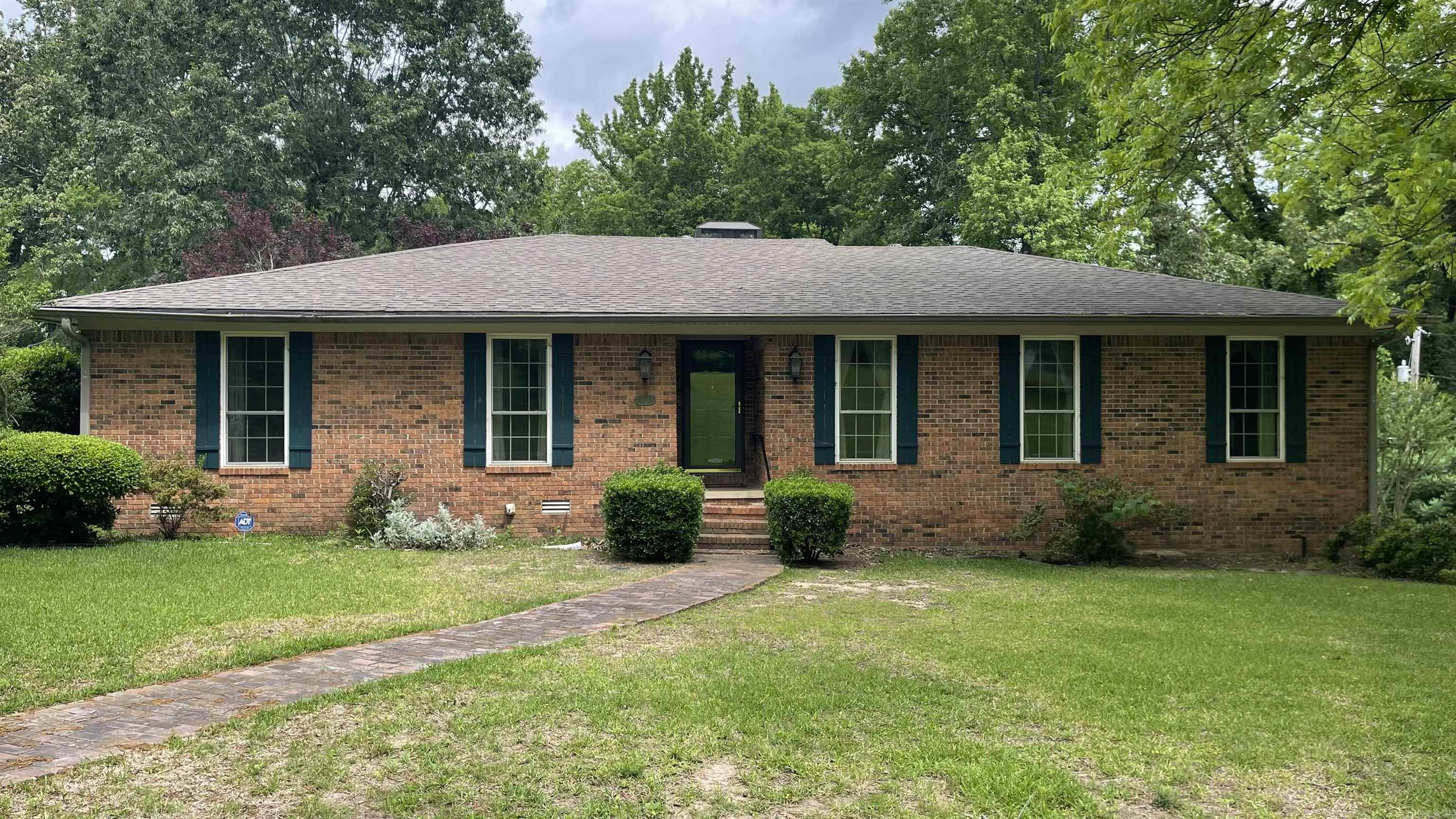 Welcome home!  Located in Valley Cliff Subdivision off Highway 5, this spacious brick home sits on a corner lot on almost 2 acres right in the City limits of Benton.  (The lot the house is located on is over half an acre.  Behind this lot, is a beautiful and buildable 1.33 acres.) The home features a formal living and dining area.  The kitchen opens into the den which has a brick fireplace with newer gas logs.  The beautiful sun room overlooks your very own private back yard.  The large master bedroom has 2 closets and the master bath features a jetted tub, walk-in shower, and storage.  In fact, there is storage in the cabinetry at the end of the hallway and in the laundry room.  The central heat/air is an older unit but seller has it serviced twice a year.  The garage is heated/cooled and has loads of cabinets for your tools and other miscellaneous items.  For your peace of mind, Seller has already taken out a home warranty with America's Preferred Home Warranty Company.  Call your agent or give me a call for a look at this property.   Update:  New roof as of 6/5/26.