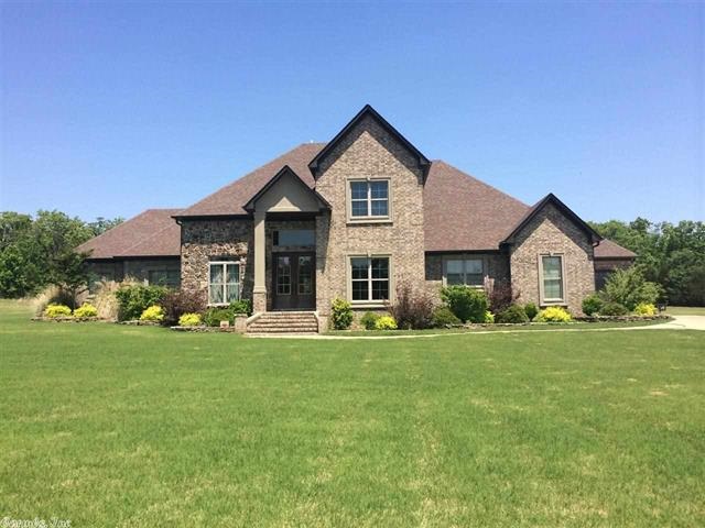Custom home w/ 4+ bedrooms, 3 1/2 baths, 3614 Sq/ft of living space, & 3 large living areas (one could be a 5th bedroom w/ addition of a door). Features include large formal dinning room, open floor plan, stained & scored concrete, stainless appliances, full size fridge & separate full size freezer, under cabinet ice maker, custom cabinets, walk-in pantry, full brick accent wall, central vac, built-in audio system, sprinkler system, security system, 8 person hot tub, & secret bookcase door to hidden room.