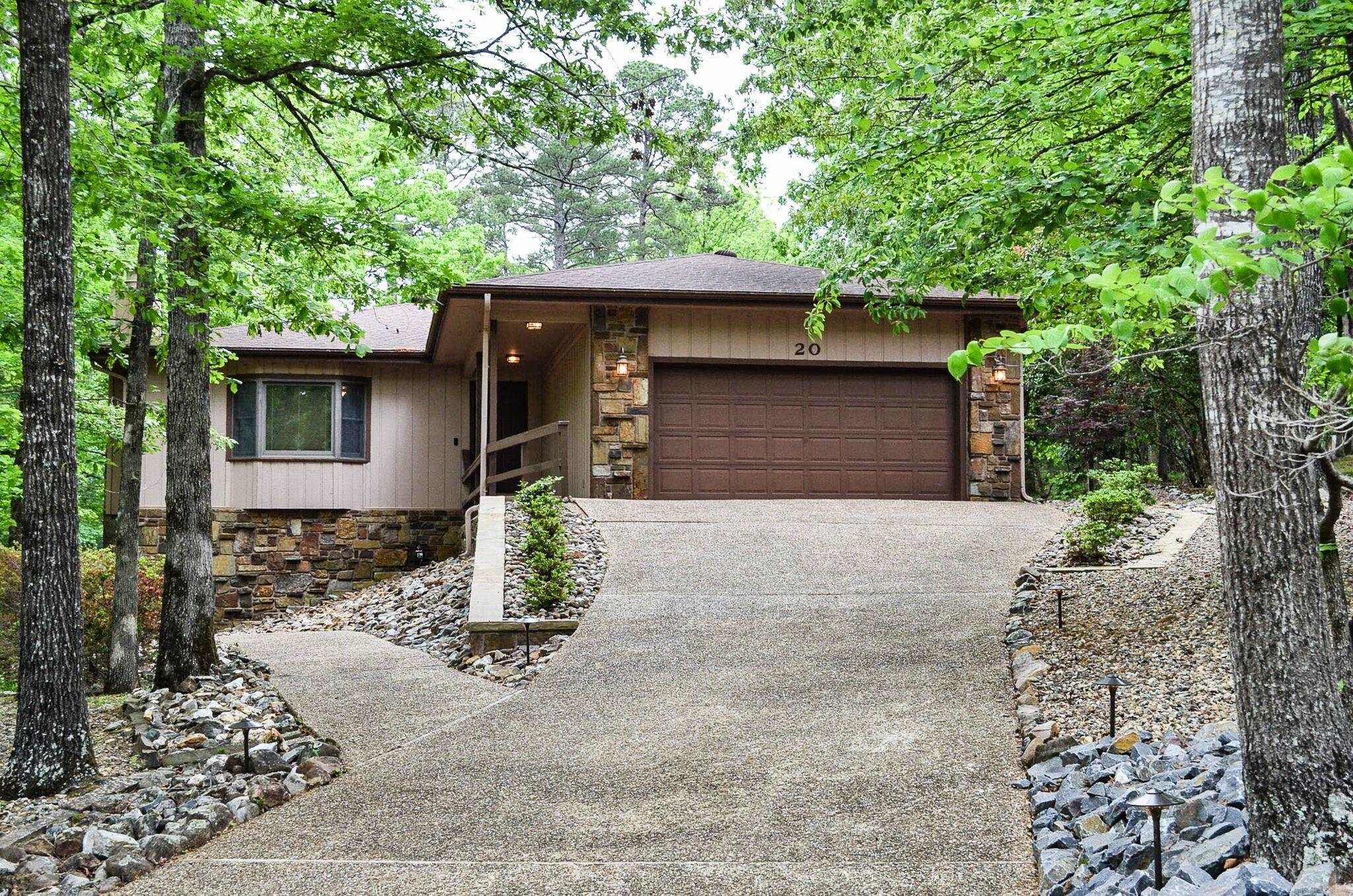 Create new memories here....Immaculately maintained 3 bedroom 3 bath home located across from Lake Segovia. This beautiful home offers a bath with each bedroom, bonus den or additional dining area plus a sun room. You have inside access to the 3rd bedroom and bath as well as a large sealed workshop/ storage area. The kitchen hosts an eat in area, separate laundry room with utility sink with multiple skylights throughout the home.Large floored attic storage area. Bennett Brothers landscaping/stonework complete this pretty picture. Hot Springs Village Property Owner Association has a new member buy-in fee of $2,000.00 due and collected at closing.