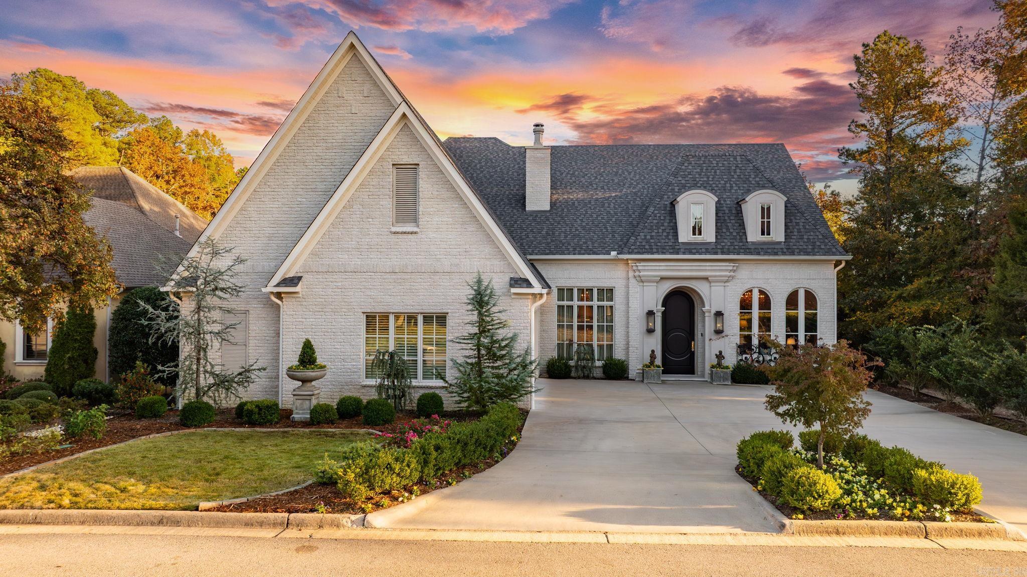 Fabulous home in the gated community of The Arbors adjacent the Chenal Valley Country Club. Stunning decor and handsome exterior combine to offer the ultimate setting for family living and gracious entertaining. Extraordinary living spaces with 12 & 14 ft ceilings, impeccable design and attention to every detail. Beautiful living room and formal banquet dining flow into family room.  Exquisite kitchen with top of the line appliances and large island adjacent breakfast area. Sunroom/den that overlooks pristine backyard oasis with beautiful gunite heated pool and cabana surrounded by lush landscape. Luxurious primary suite on the main level with gorgeous bath and spacious closet. Sep. sitting area off the primary and office. Upstairs two large bedroom and two full bath along with bonus/media which could serve as 4th bedroom. This is truly an exceptional home with impeccable craftmanship and extraordinary elegance. Garage is heated and cooled. Speaker stereo system, full house generator, storm shelter, versa lift in garage. Quality construction by Mary Jane Herr.  Please call for complete list of outstanding amenities. A must see!