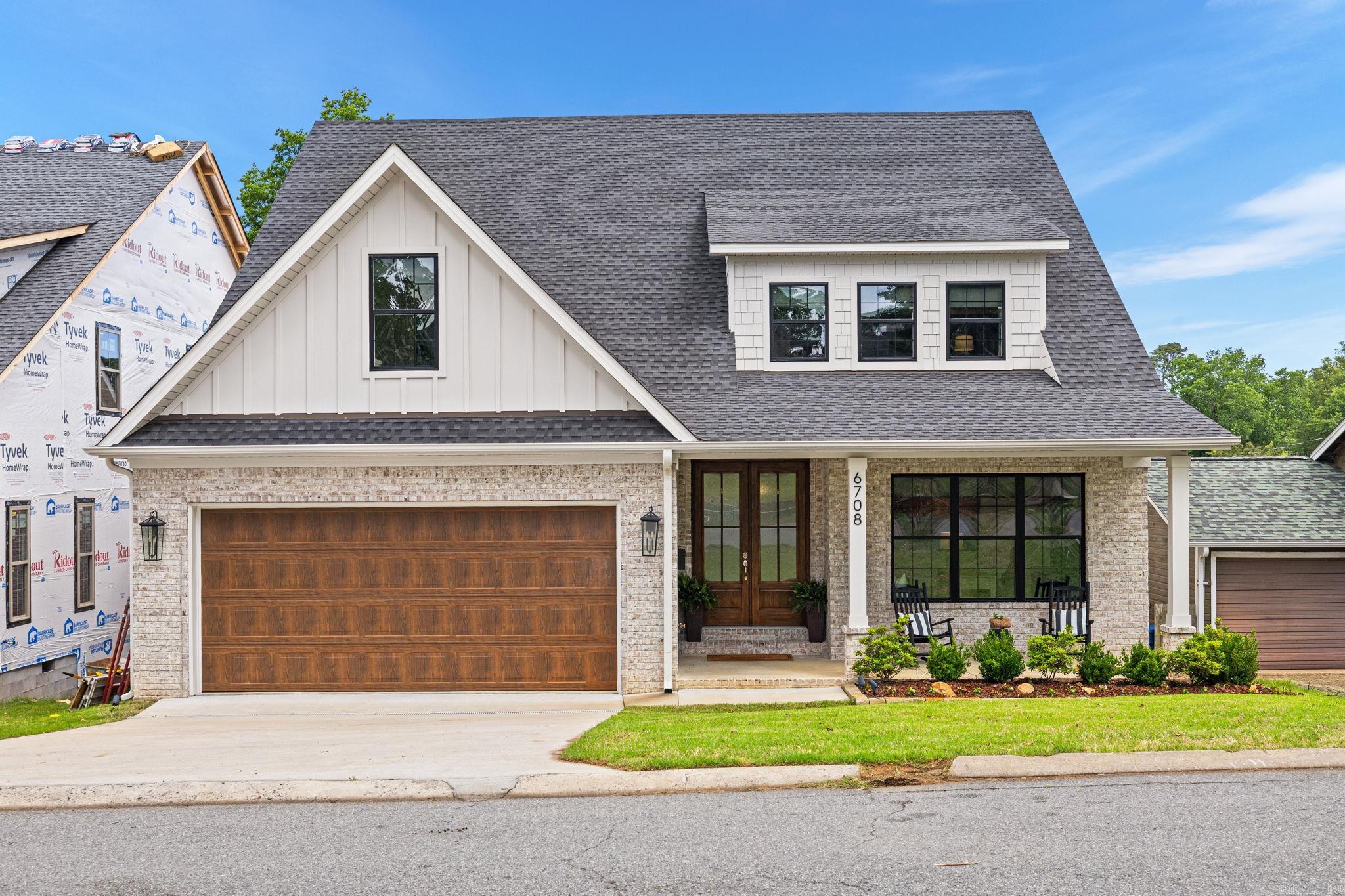 Welcome to 6708 Rockwood Road, a custom-built 2024 home in the heart of Cammack Village offering the perfect blend of luxury, functionality, and location. With 3,750 square feet, 5 bedrooms, and 3.5 bathrooms, this thoughtfully designed residence features a spacious floor plan with the primary suite conveniently located on the main level.  The stunning kitchen and living spaces are designed for both everyday living and entertaining, while large windows provide abundant natural light throughout. Upstairs offers additional bedrooms and flexible living space, including a room currently utilized as a home office. A unique hidden door leads to a private basement area, adding character and versatility rarely found in newer construction.  Enjoy outdoor living with covered porch space, a wood deck, privacy fencing, and a beautifully maintained lot. Located just moments from Baker Park, one of Cammack Village's most beloved community amenities, you'll enjoy easy access to parks, recreation, shopping, dining, and everything central Little Rock has to offer.  Schedule your private showing today!