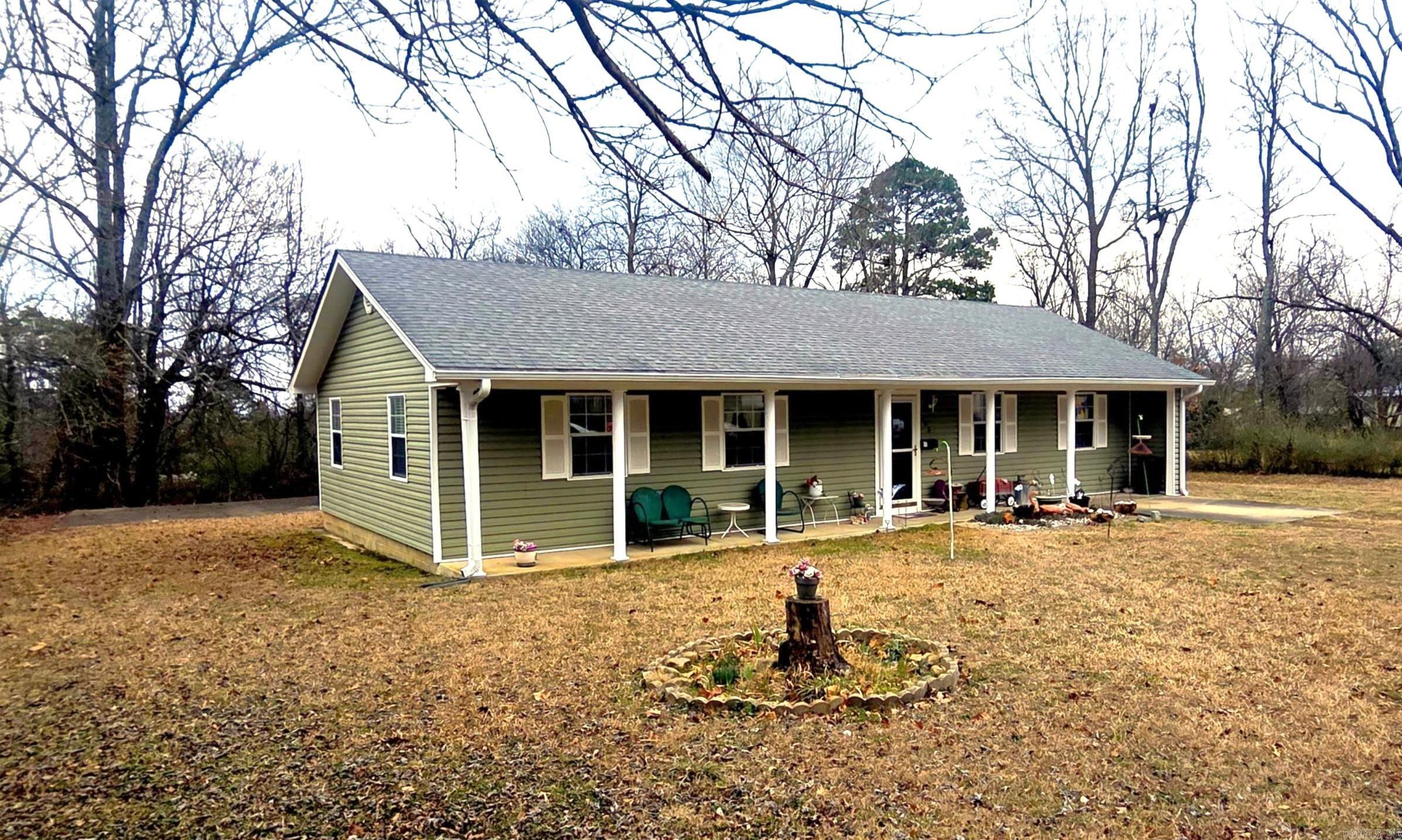 Welcome to this charming 4-bedroom home in the heart of Mena! Situated on almost a quarter-acre lot, this 1,200 sq ft property offers room to spread out both inside and out. Relax on the inviting front porch. The spacious layout provides flexibility for family living, guests, or a home office. Plus, the fenced backyard is perfect for pets, play or entertaining. Don't miss this opportunity to make it yours!