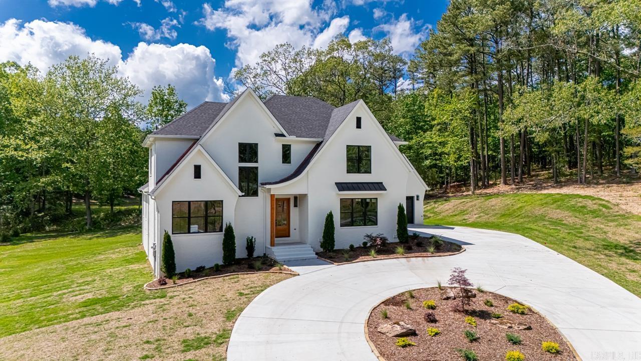 Picture Perfect New Construction Home with Breathtaking View Overlooking Private Lake .... Amenities Include: Approximately 4094 Square Feet, 5 Bedroom, 4 Bathrooms, Grand Living Room with Gas Log Fireplace and Built -In Cabinets, Open Floorplan, Kitchen/Dining Combo, Living/Dining Combo, Breakfast Bar, Large Pantry, Gas Range with Double Ovens, Downstairs Bedroom/Office, Primary Bedroom with Private Lake View, Primary Bathroom has Custom Tile Shower with Free Standing Tub, Exquisite Primary Bathroom and Closet, Upstairs boasts 3 Bedrooms and 2 Bathrooms, Media / Flex Room, 3 Car Garage, Large Covered Patio overlooking Private Lake, All Sitting on 3.05 acres +/-. Close and Convenient to all Area Shopping, Dining, Churches, Schools... This is Truly a Custom Home.... A Must See...